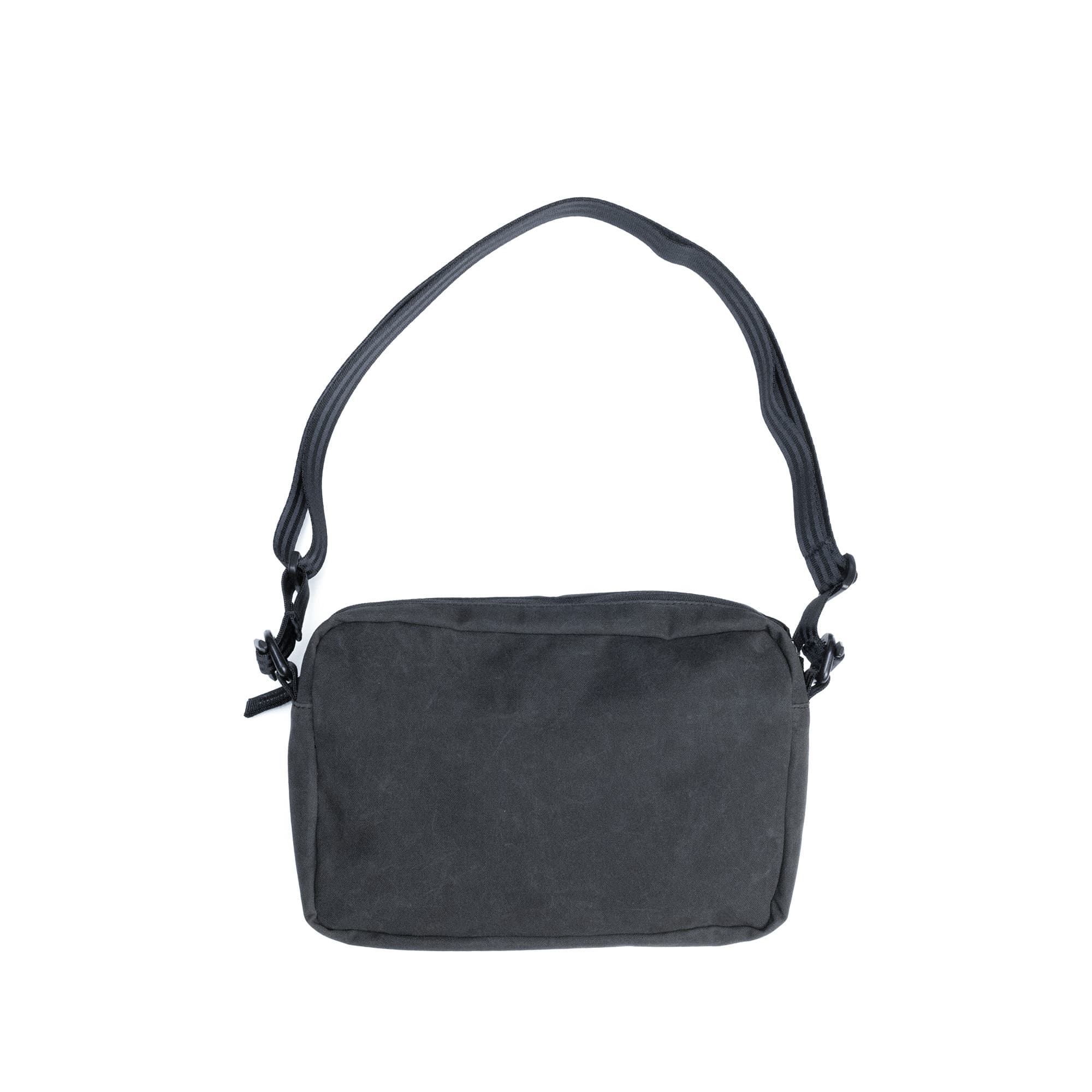 The back of the Pac Shoulder 3L Pouch in Black Canvas Leather #color_black canvas leather