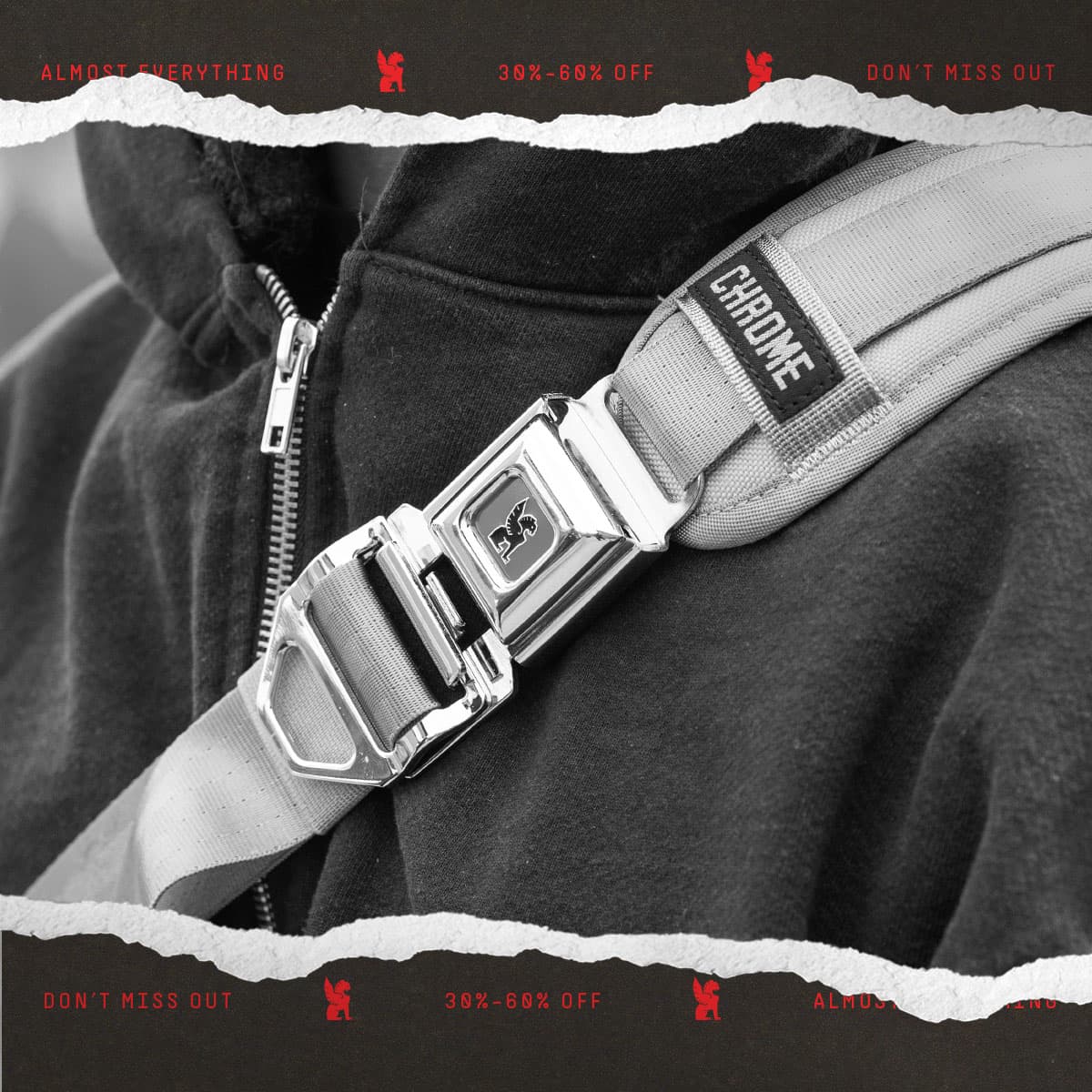 Gray strap with Chrome logo and buckle worn by a person, with 30-60% off Sale callout