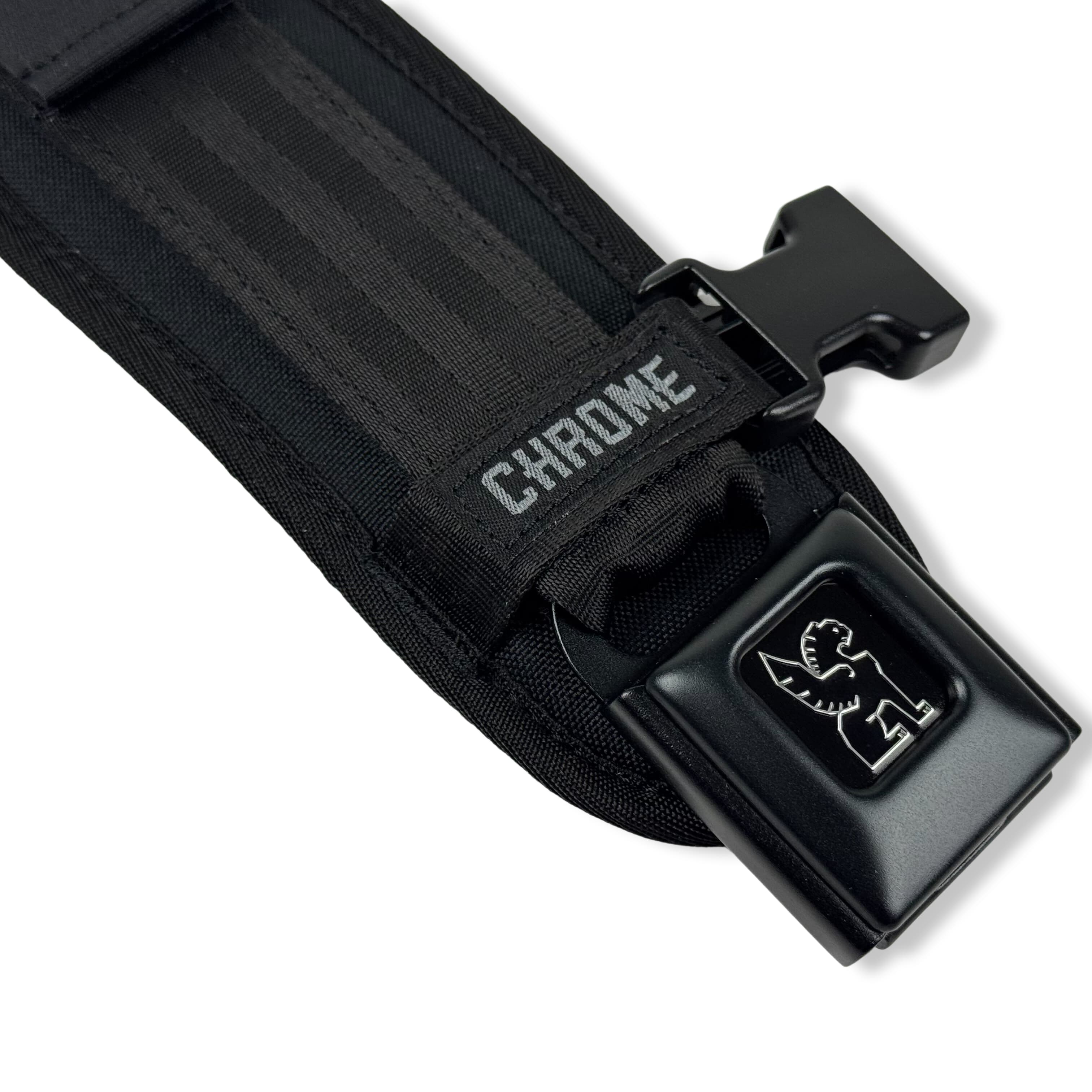 Up close on the black buckle of the Shoulder replacement strap in black