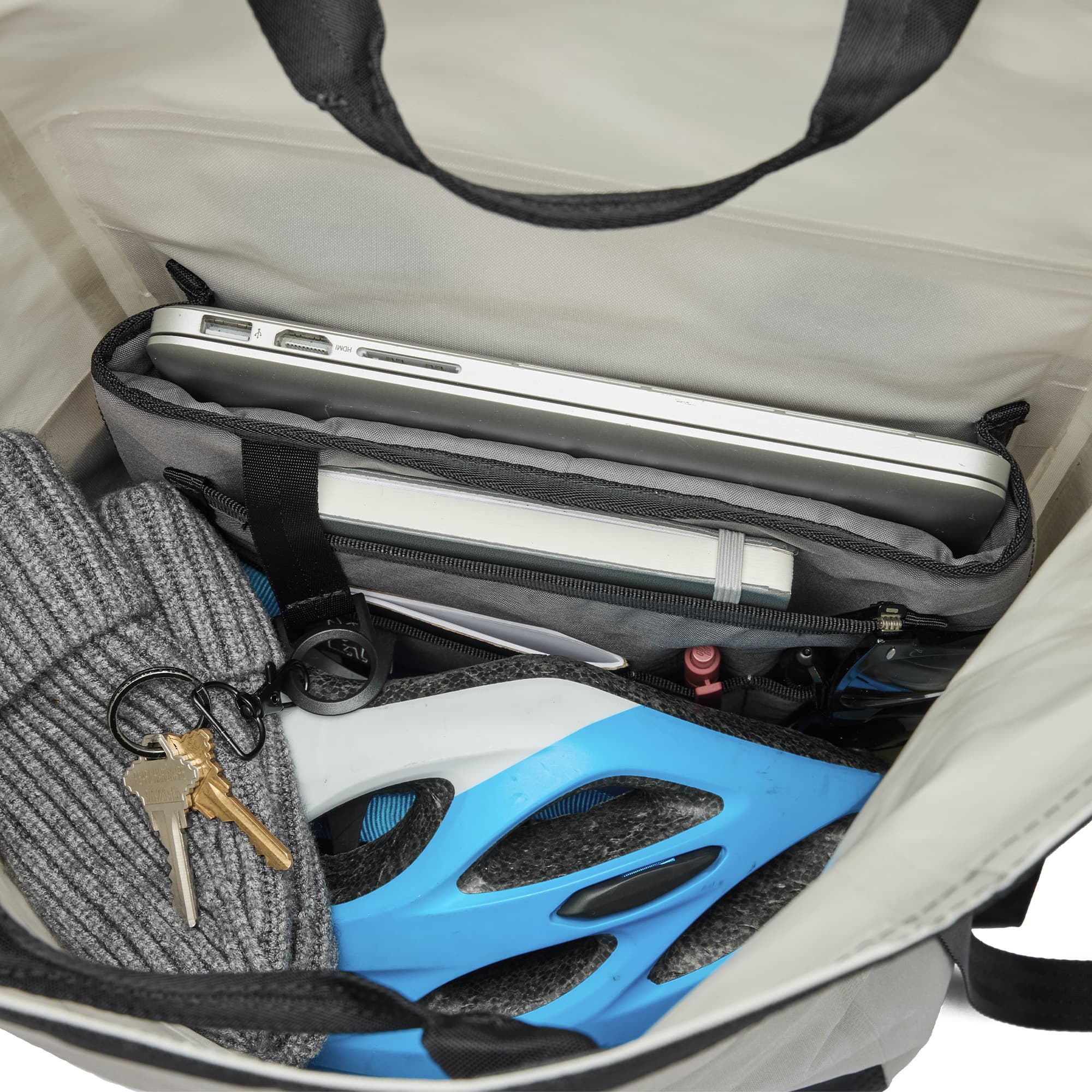 A stuffed bag of the Urban Ex backpack in future white #color_future white