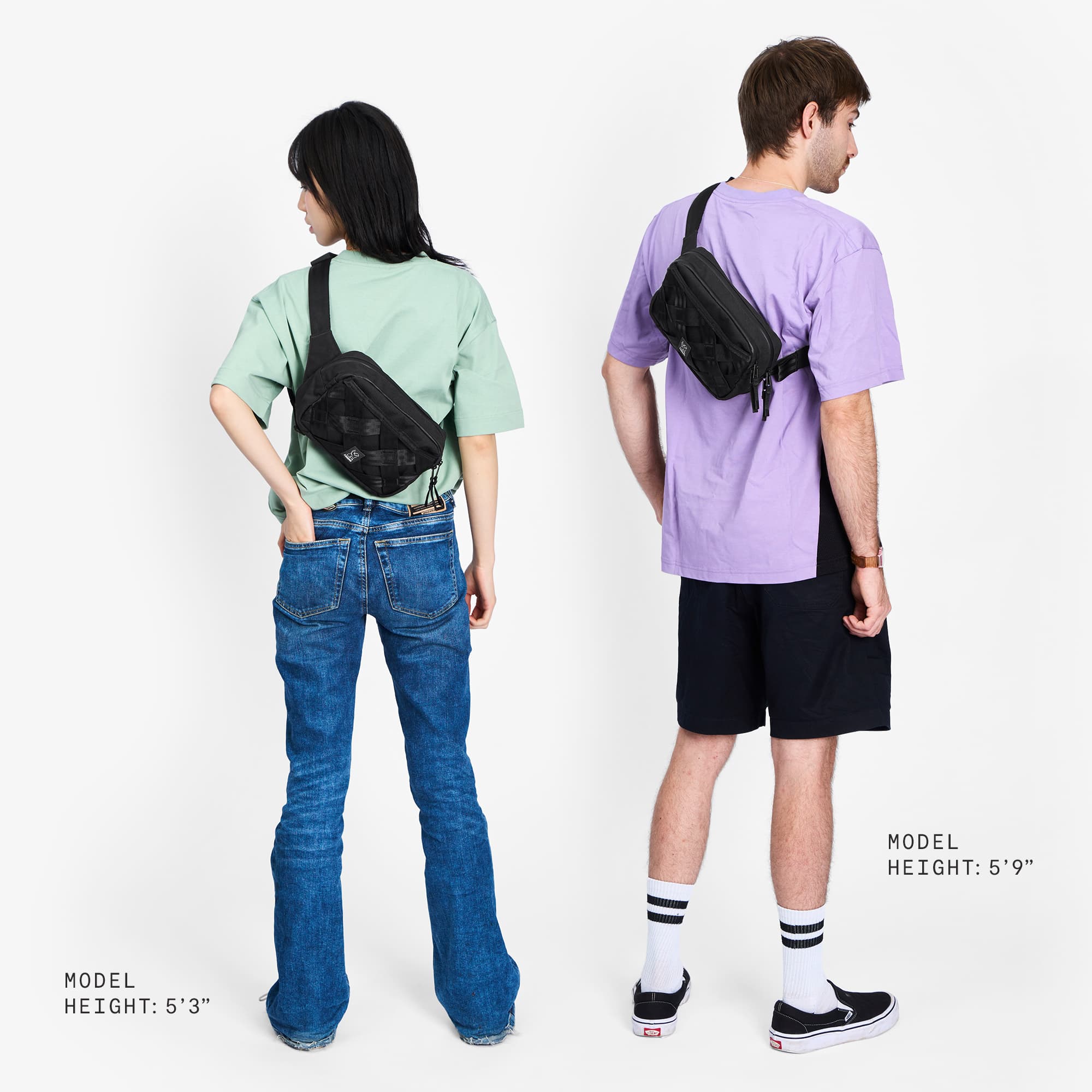 Two people wearing the Barrage 5L who are different heights showing proportion