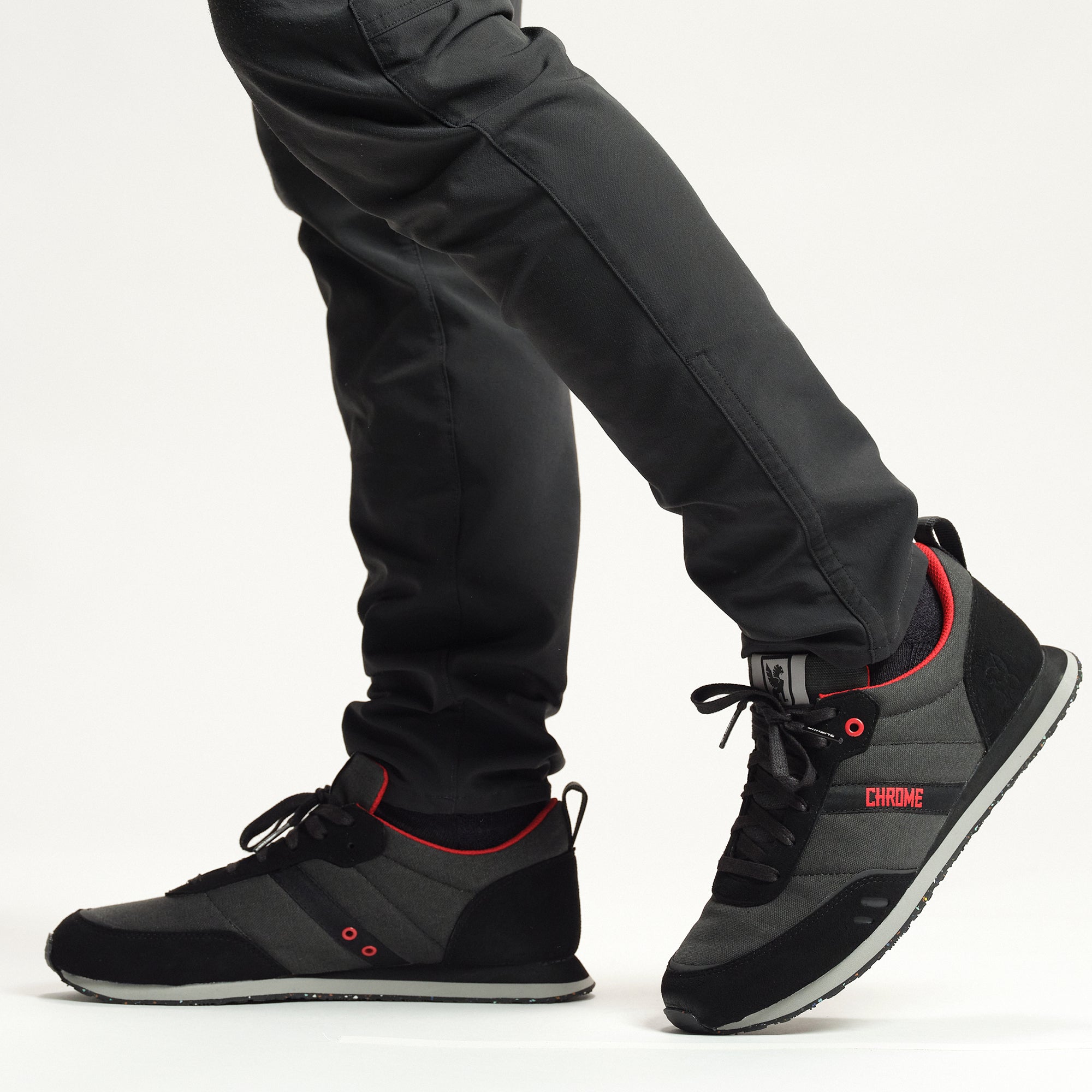 Powell sneaker in black on a person #color_ black grey