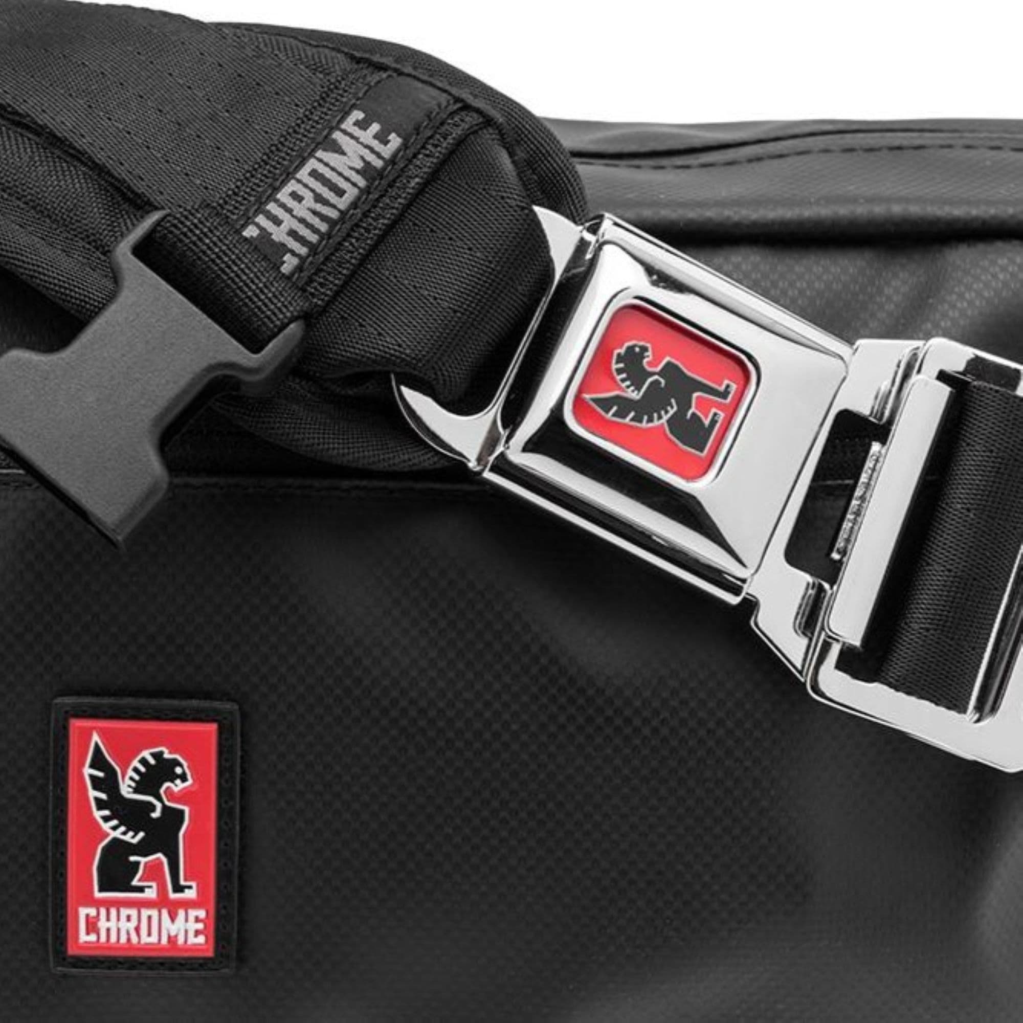 A buckle close up of the Kadet 9L Sling in black tarp #color_black tarp