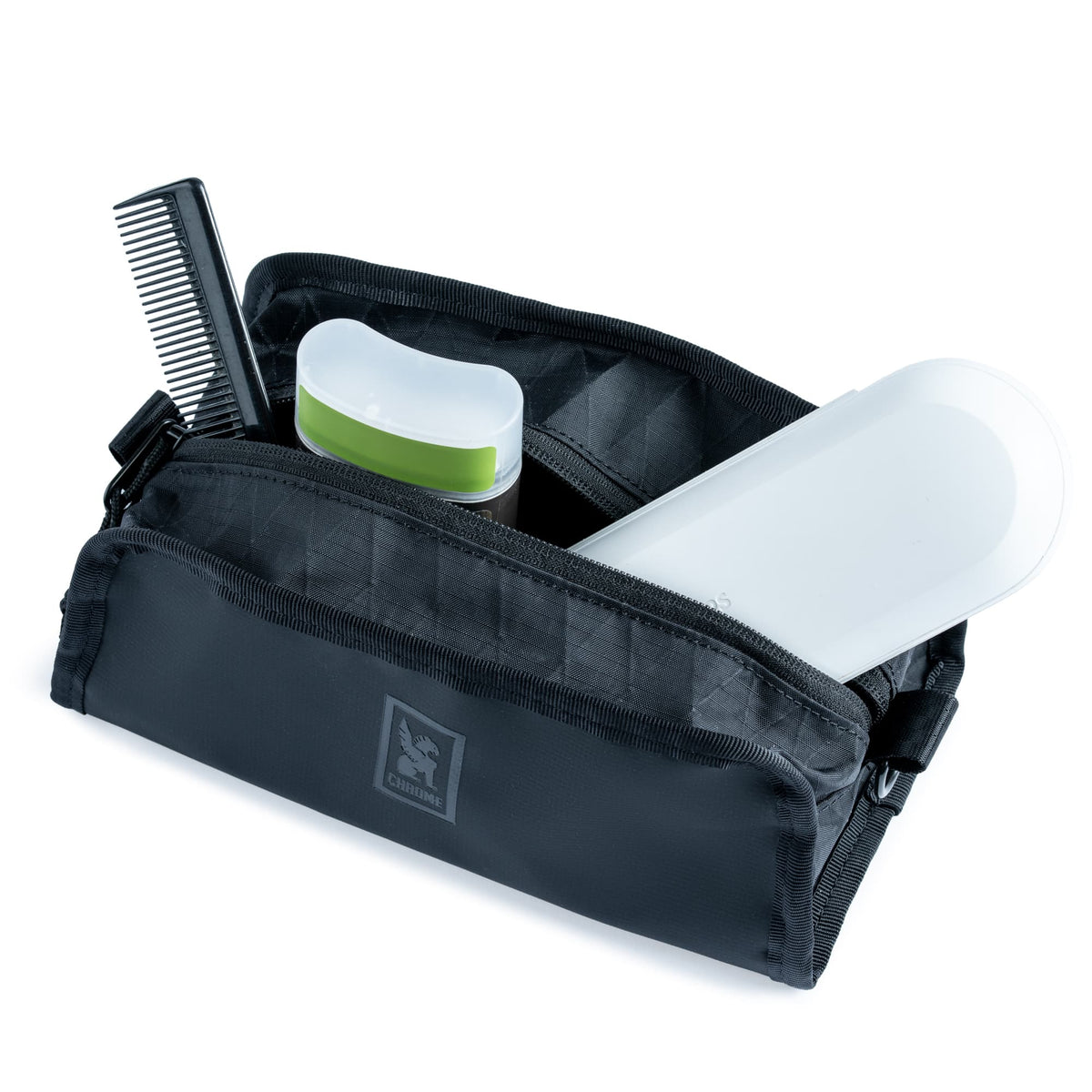 The Zip Utility Pouch filled up with products
