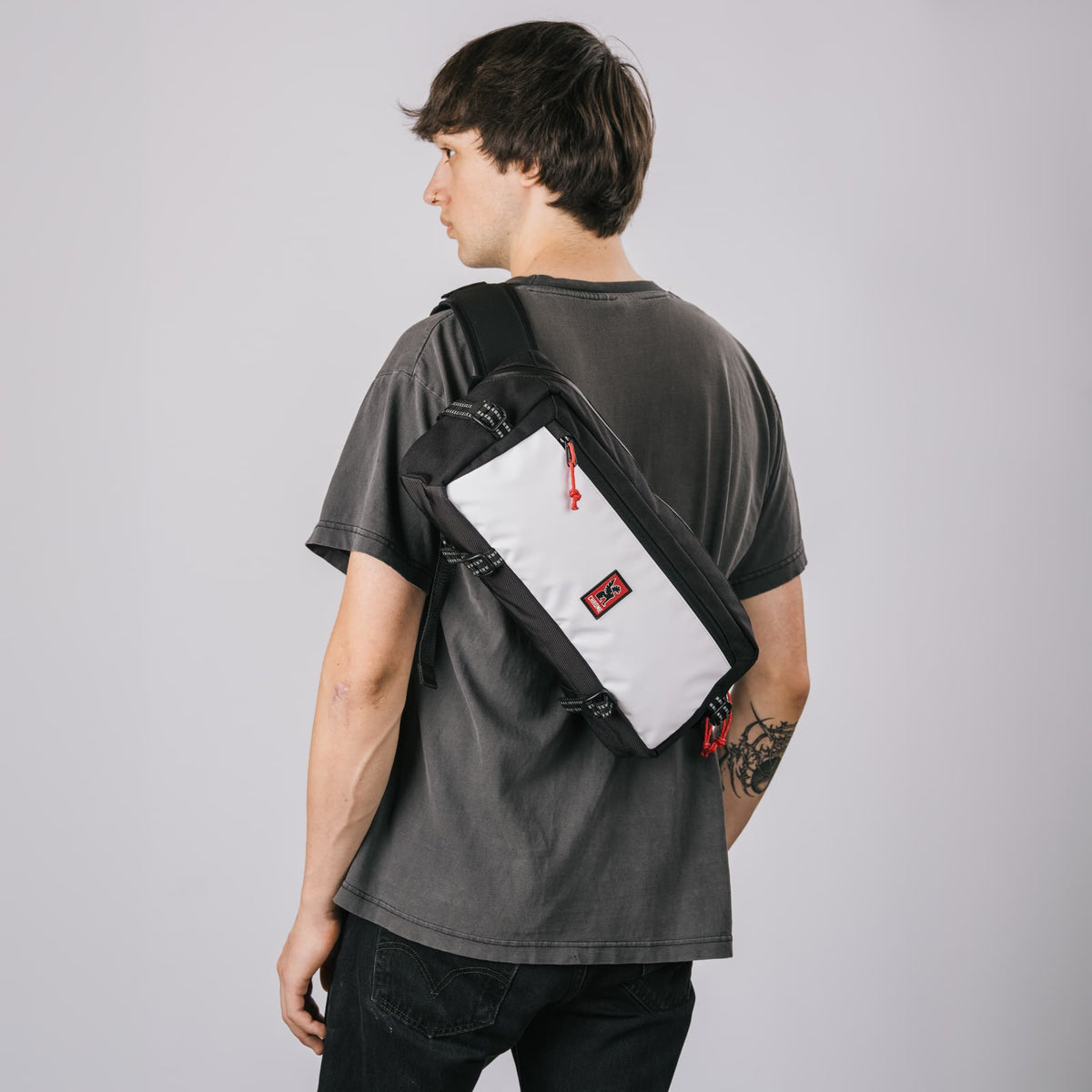 A guy wearing the Kadet in the new Holiday Black and White Collection #color_classic / black / white