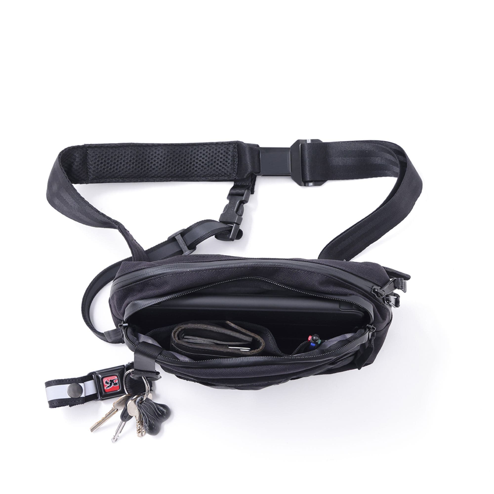 The inside of the Barrage 5L Sling with items in it