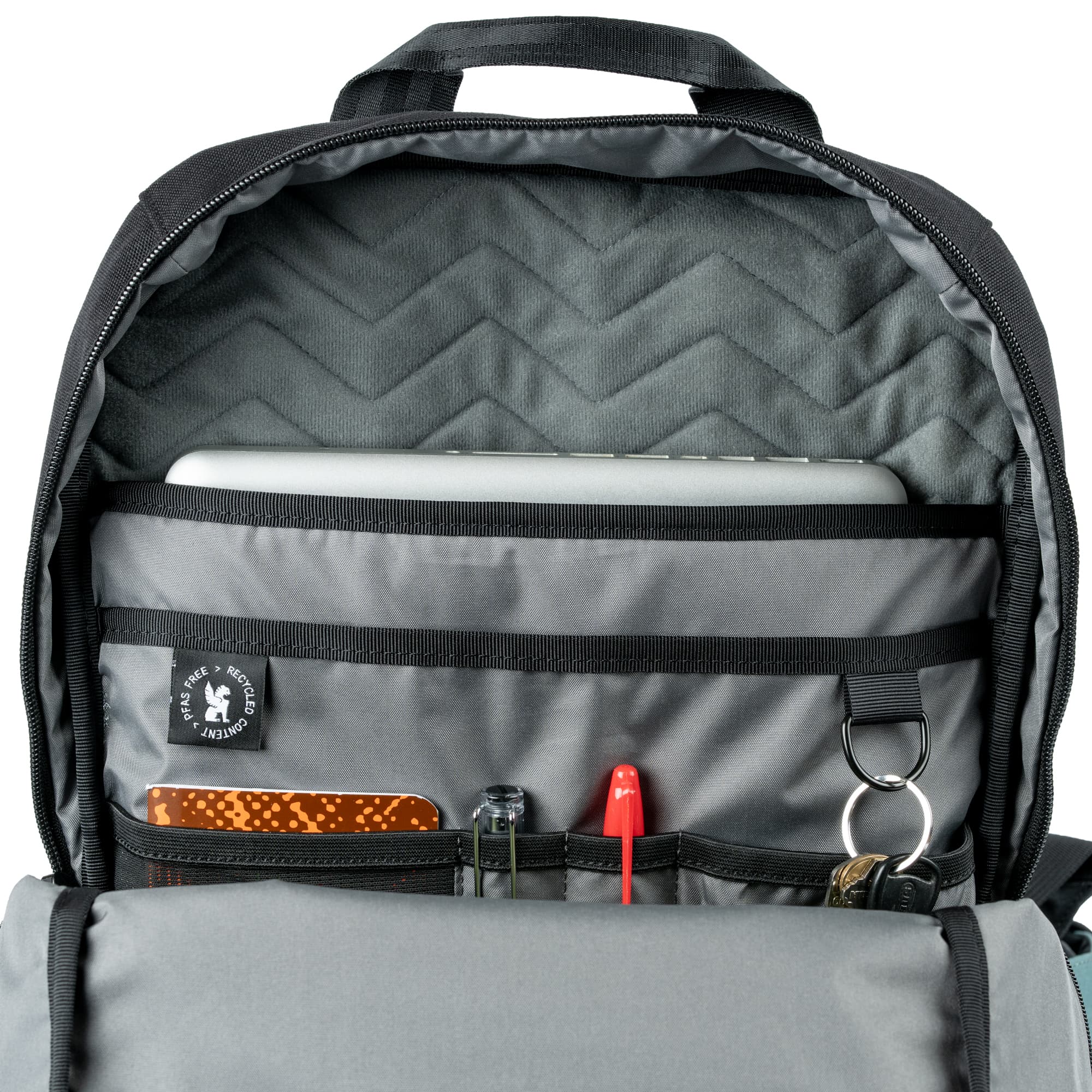 The inside of the new Recruit 22L Backpack packed out.