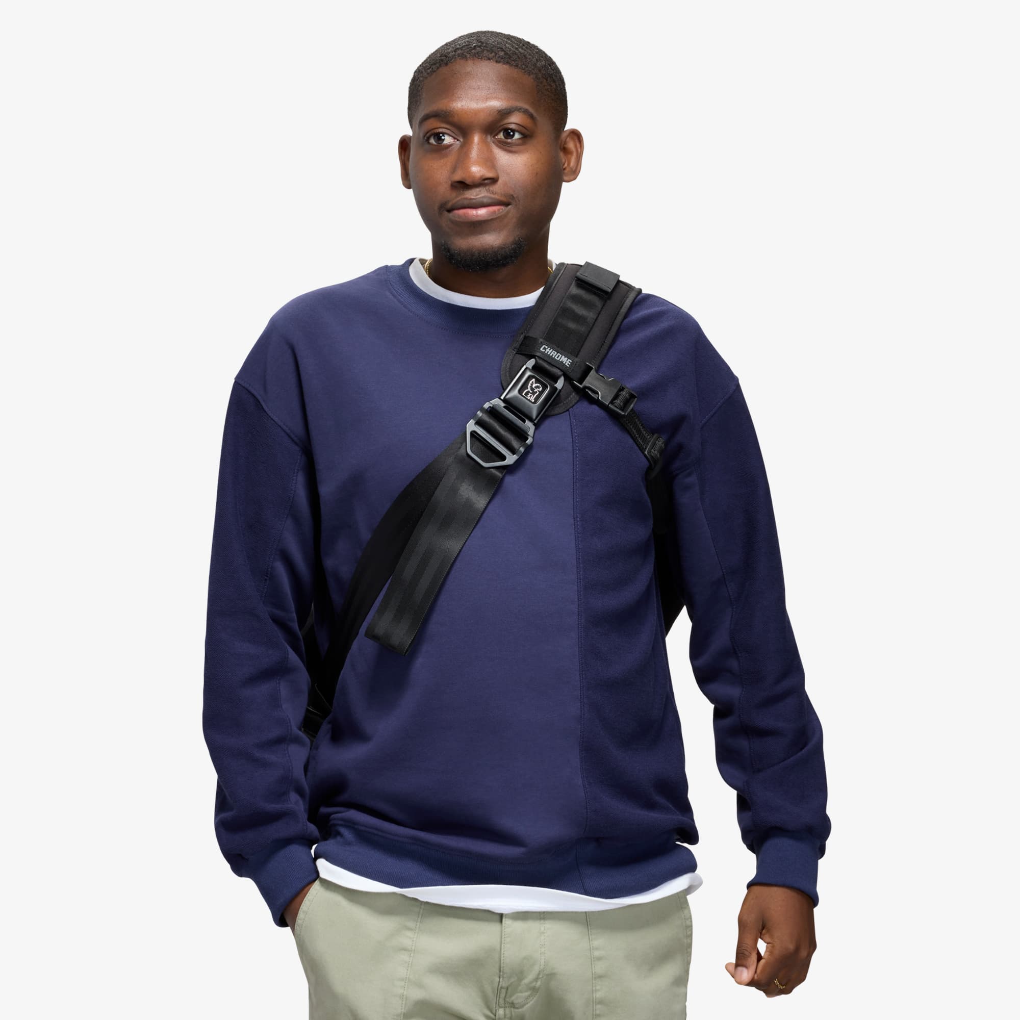 Man in a blue shirt wearing the Citizen 24L Messenger