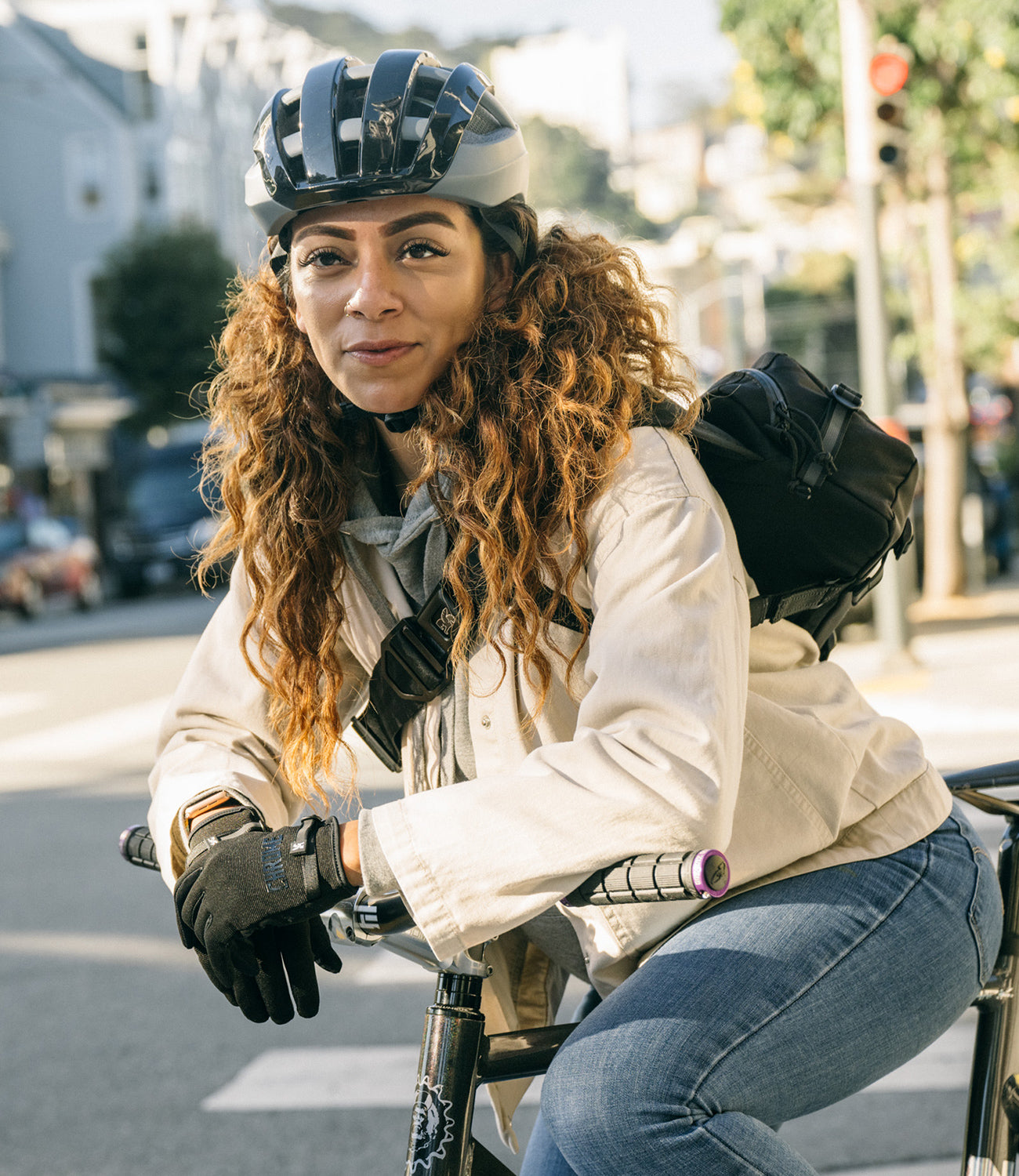 Cycling gloves on a woman mobile image