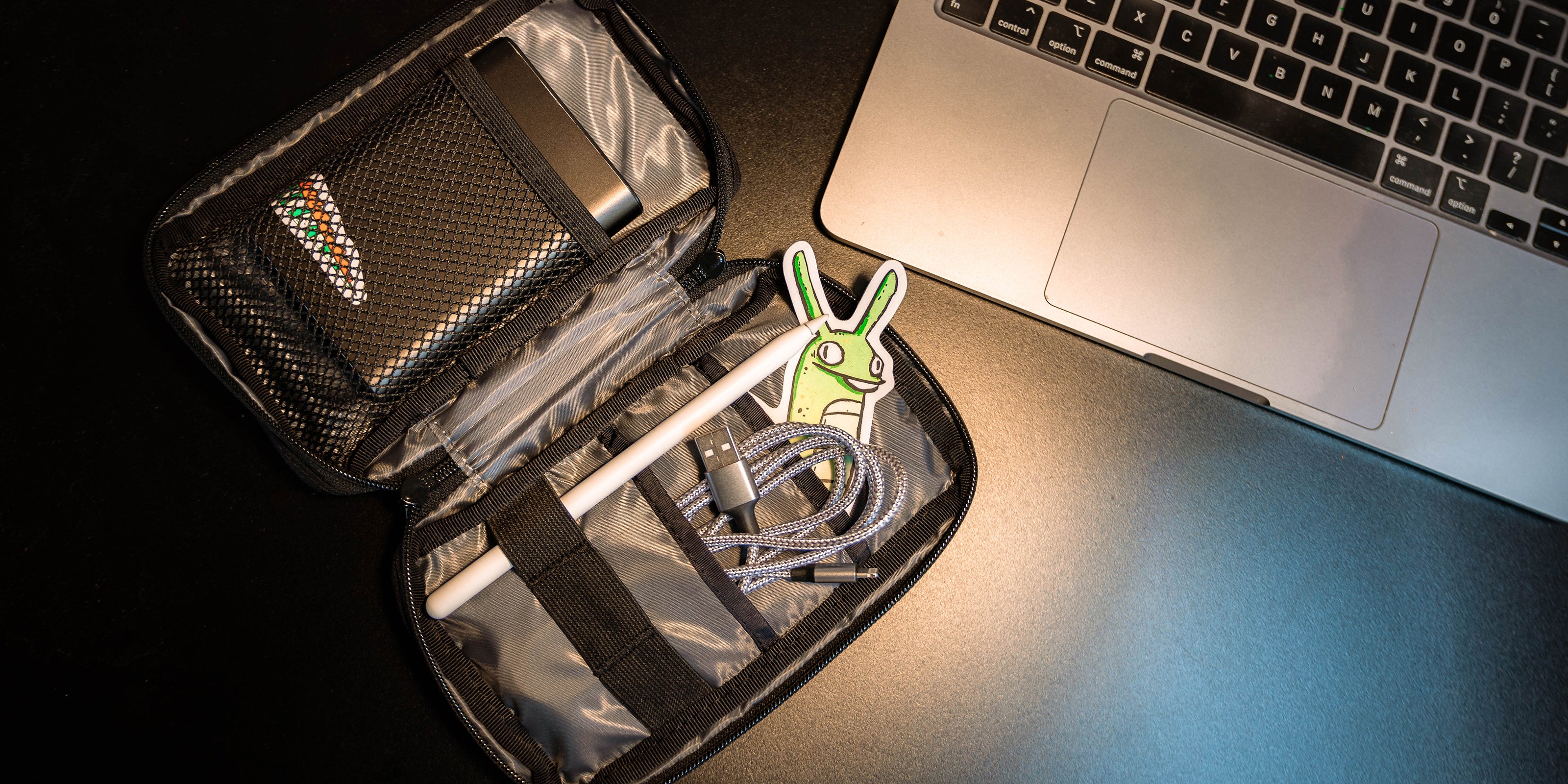 Tech Accessory pouch inside view on how all the tech fits desktop image size