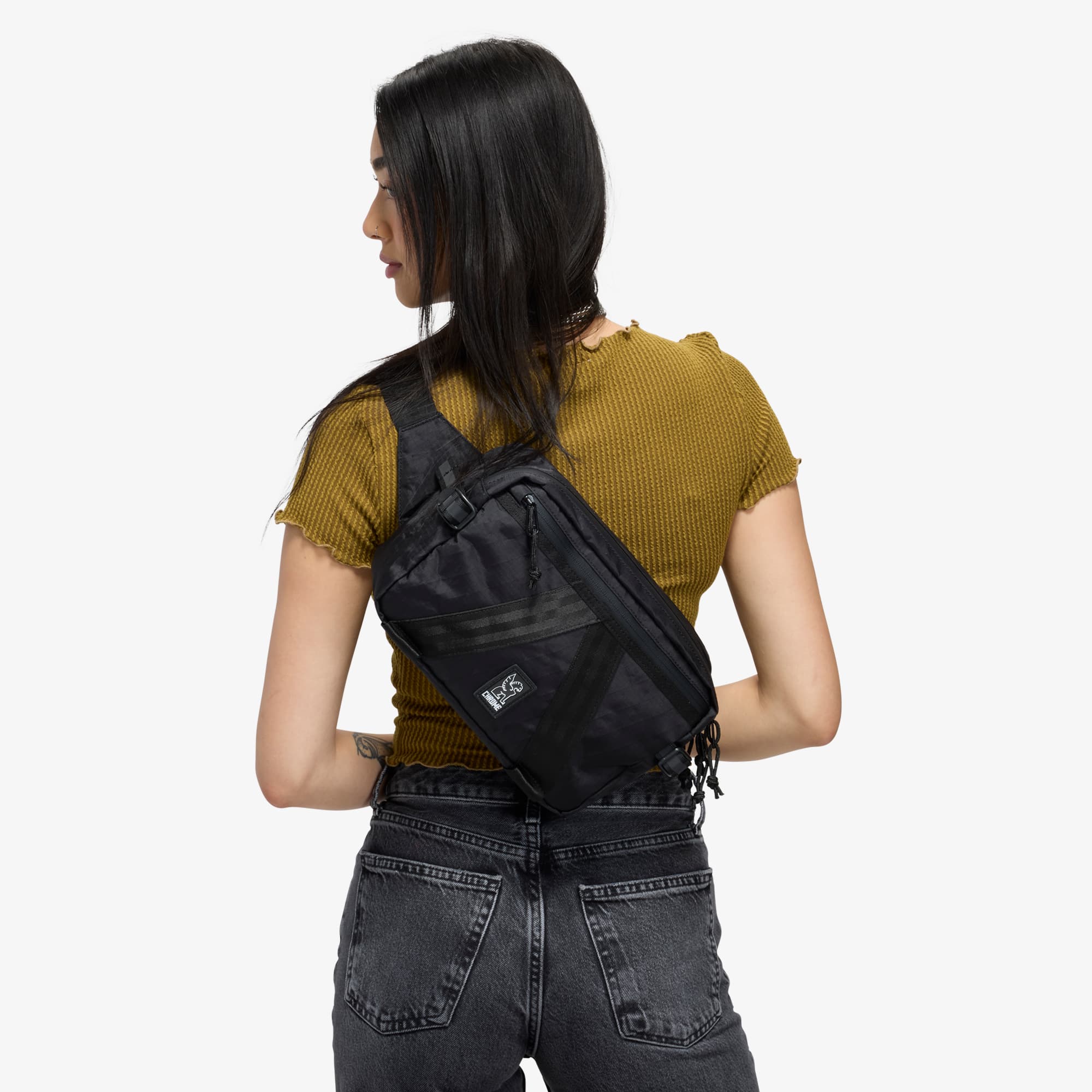 Tensile Sling in black on a woman