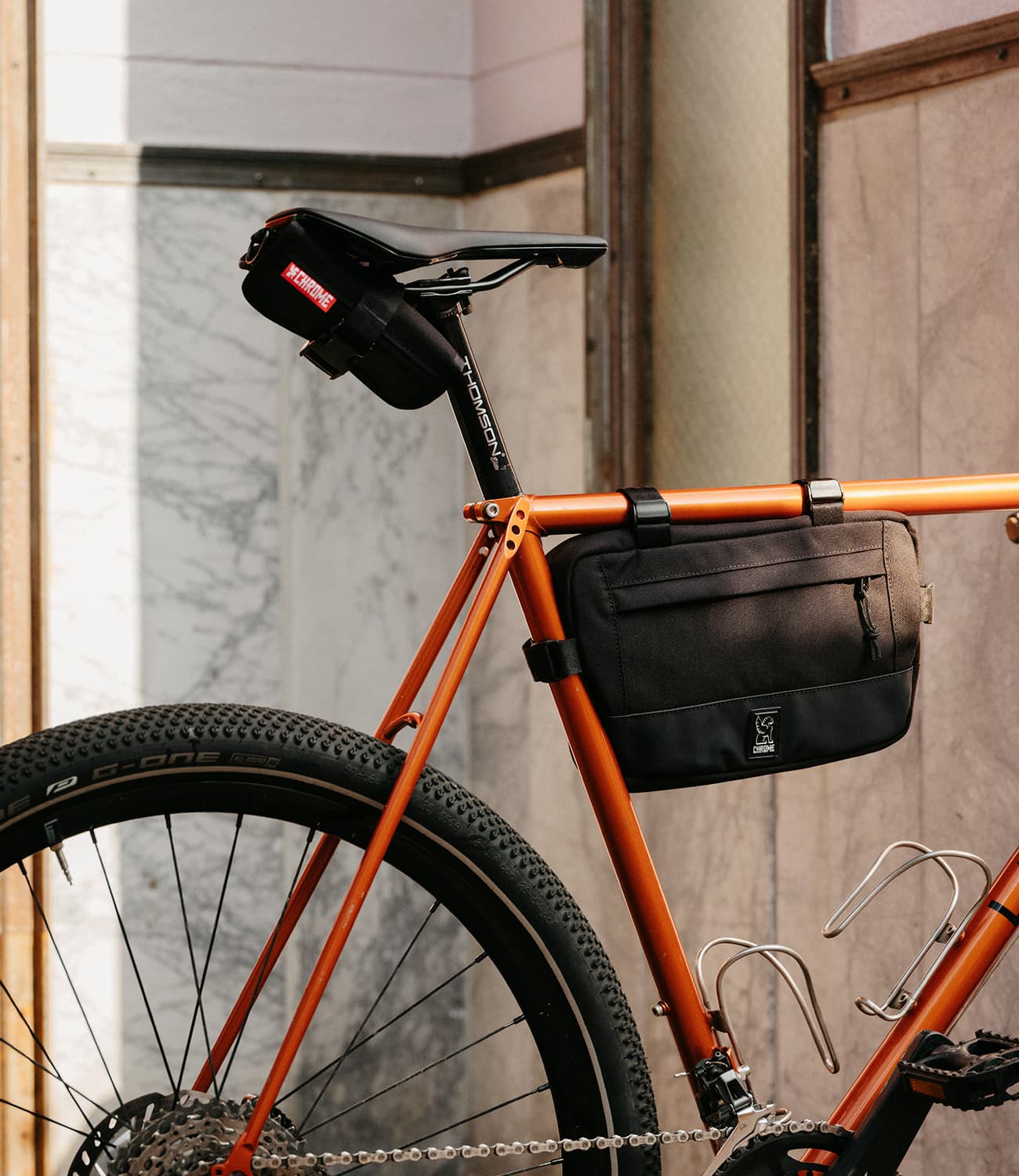 Doubletrack saddle roll on an orange bike mobile image