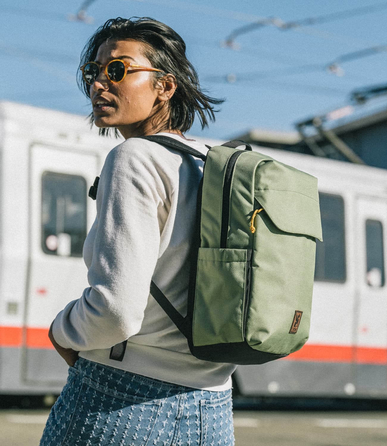 Ruckas 14L Backpack worn by a person commuting