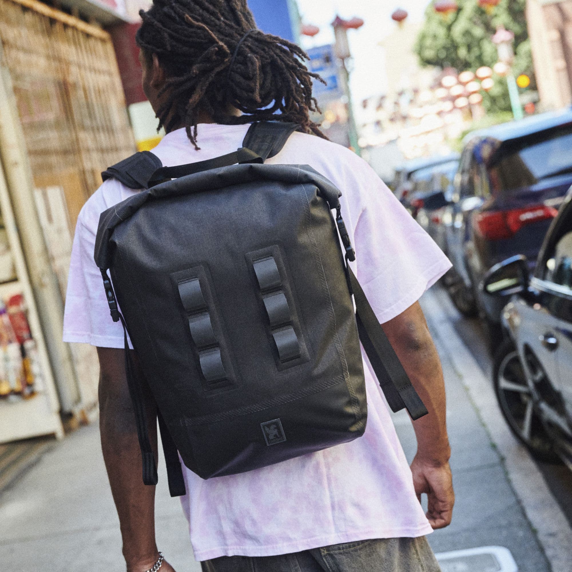 Man wearing the Urban Ex walking around