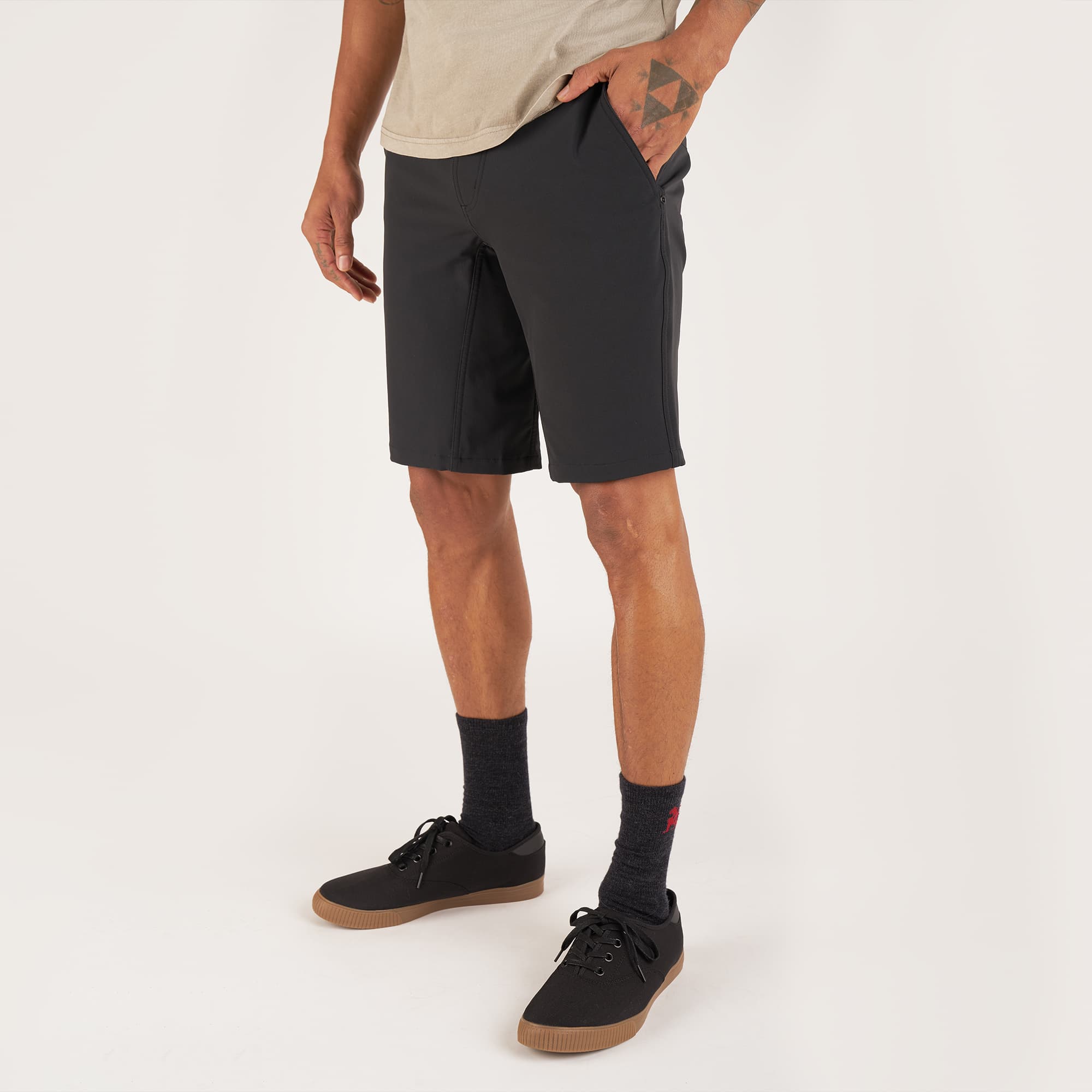 Men's Folsom tech biking Short in black worn by a man #color_black