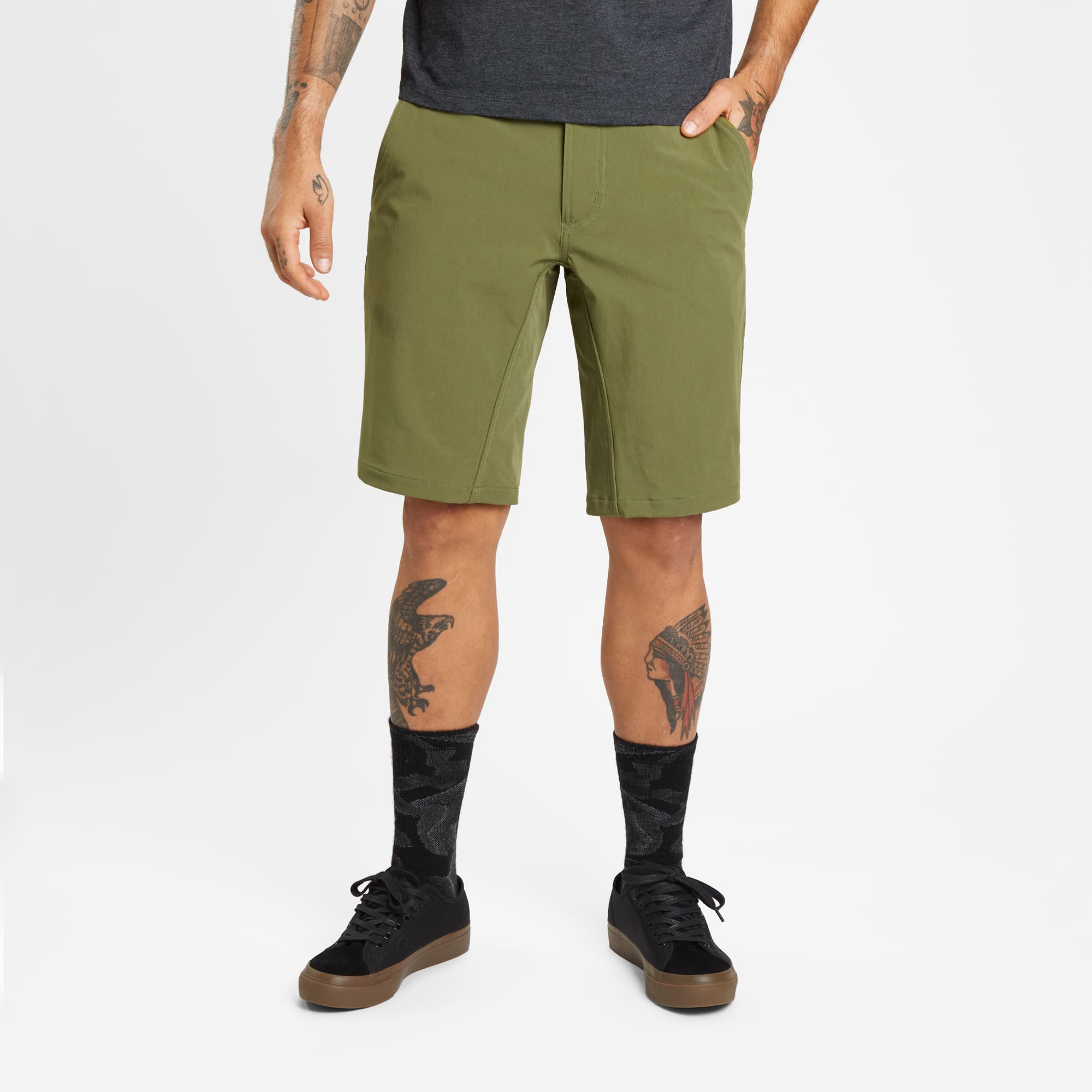 Men's Folsom tech biking Short in green worn by a man #color_olive branch