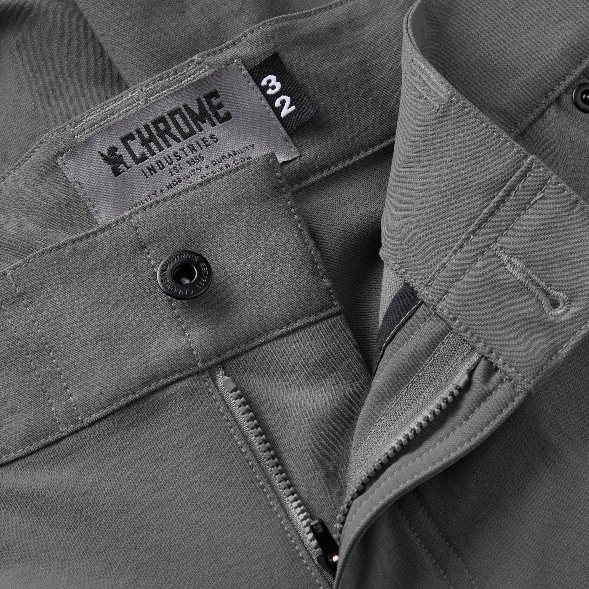 Men's Folsom tech biking Short in grey button & zipper detail #color_castle rock