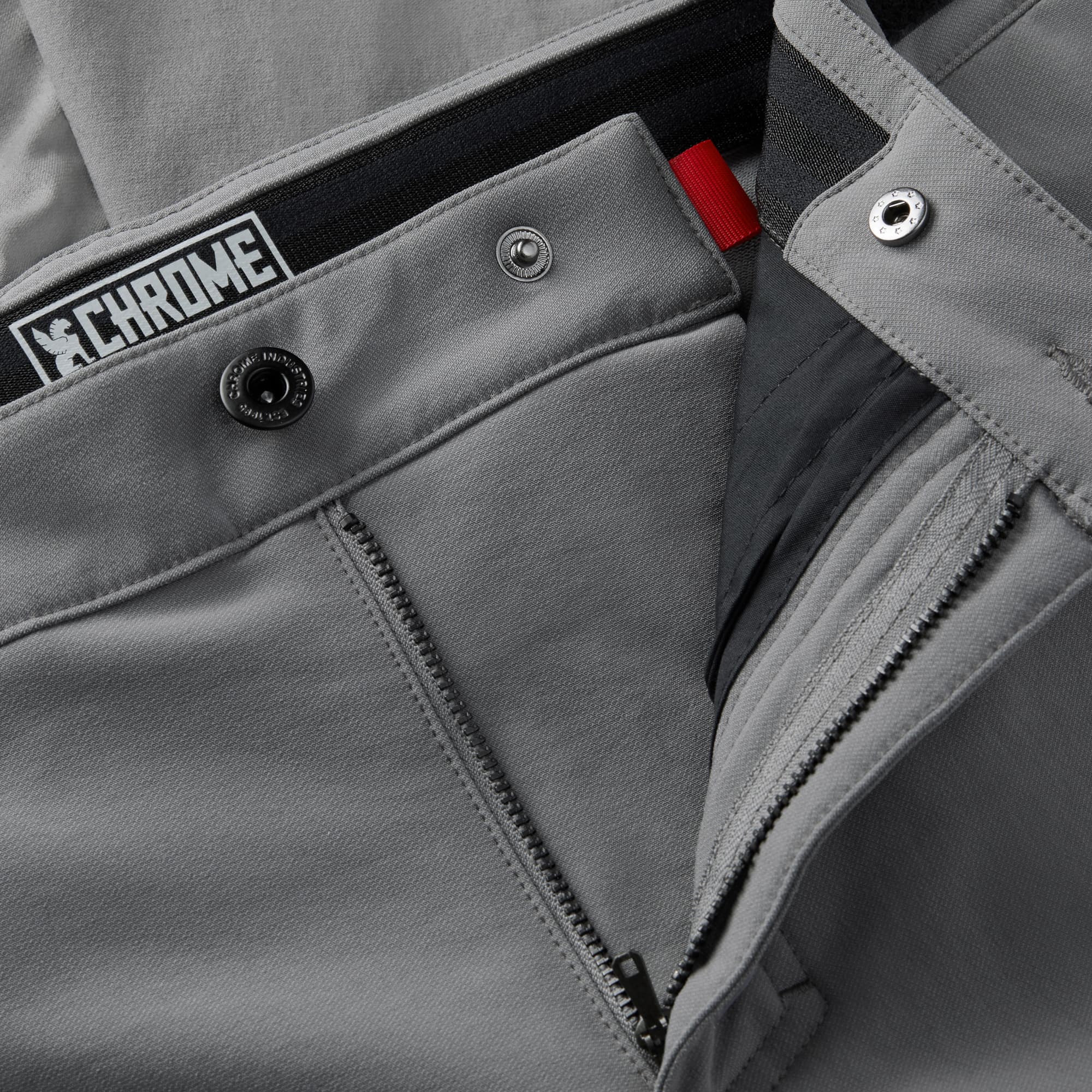Men's tech Sutro Short in grey button & zipper detail #color_castle rock