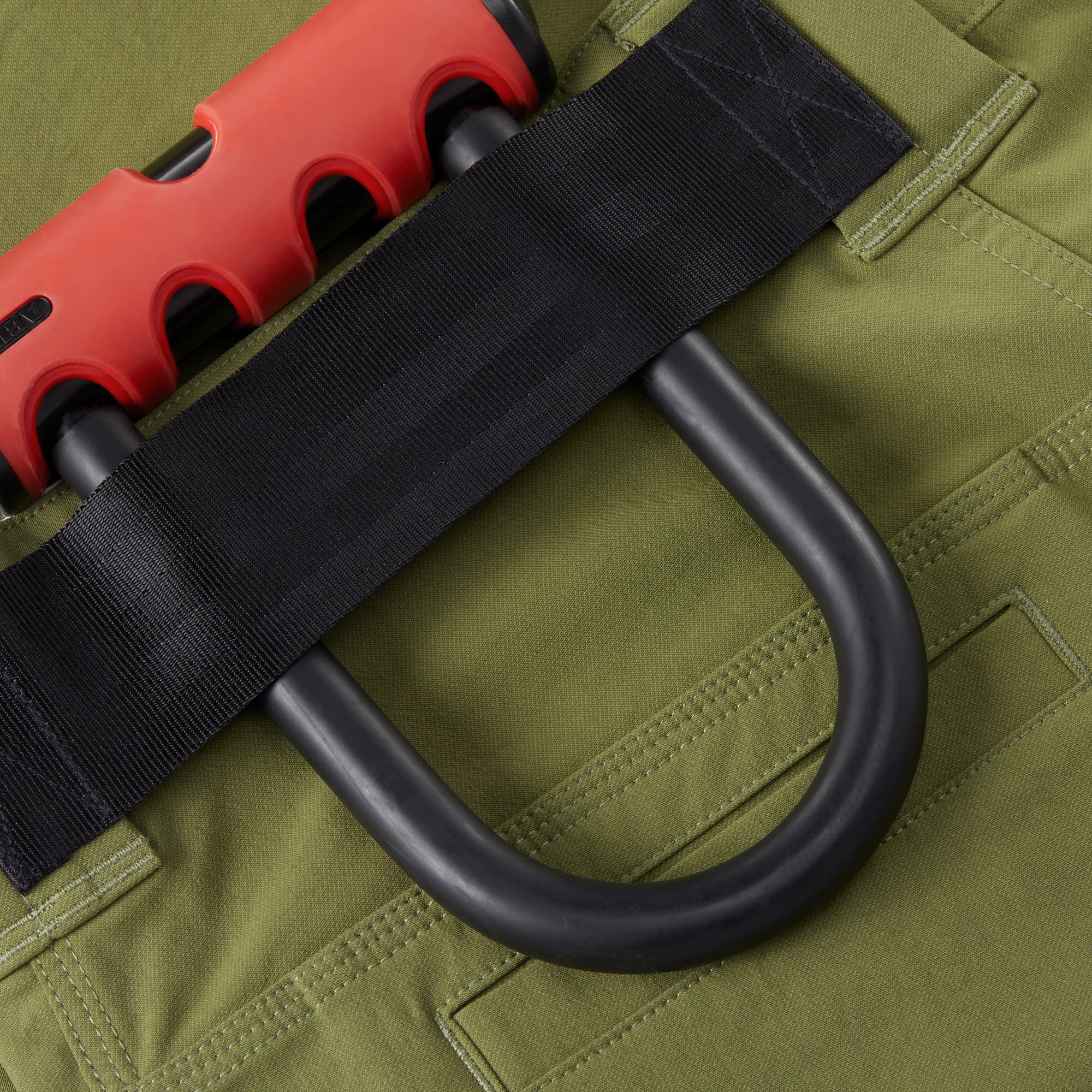 Men's Folsom tech biking Short in green u-lock view #color_olive branch