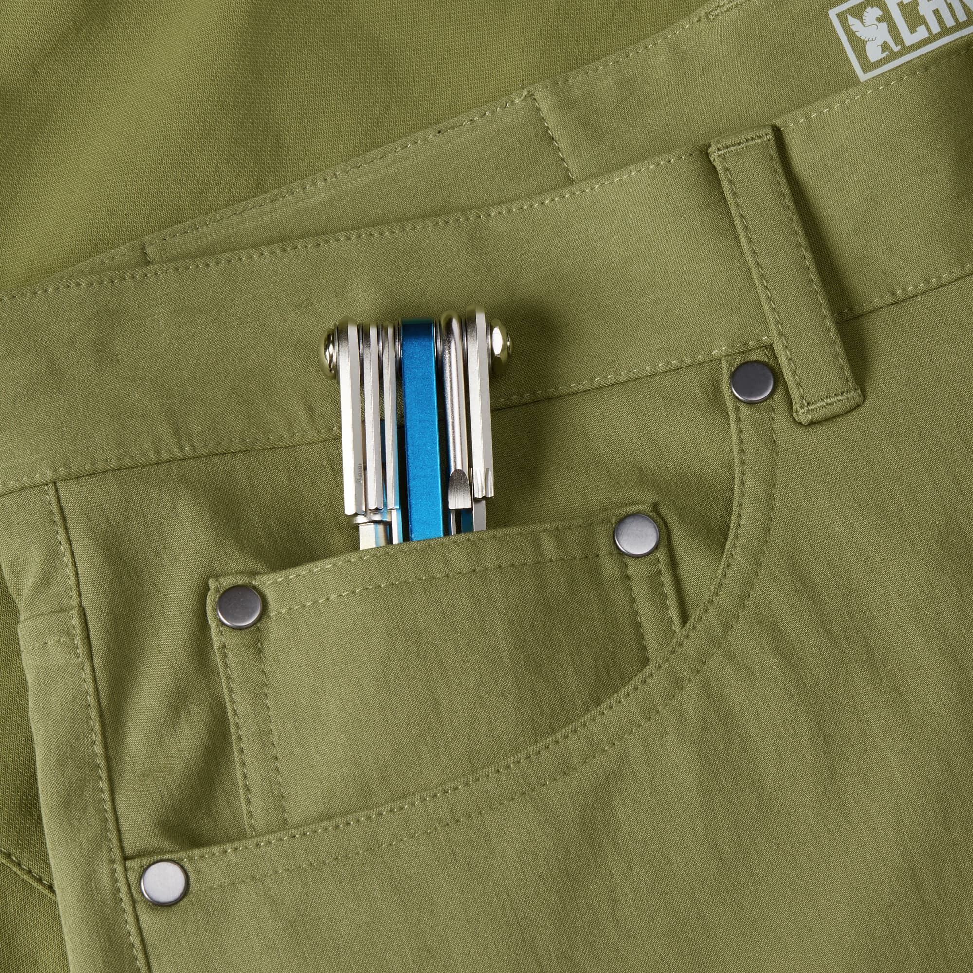 Men's Madrona 5-pocket short in green pocket detail #color_olive branch