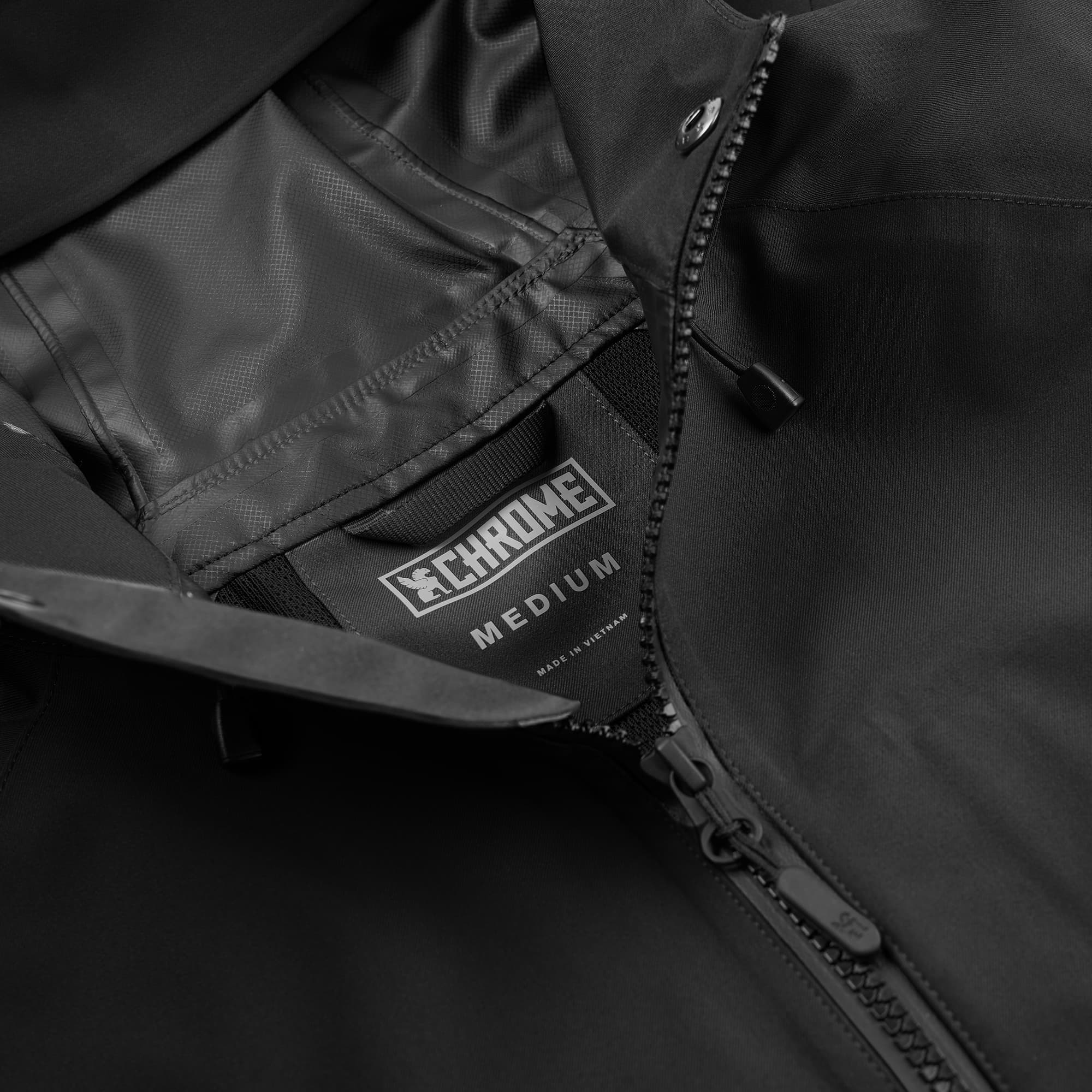 Waterproof rain jacket in black top zipper detail