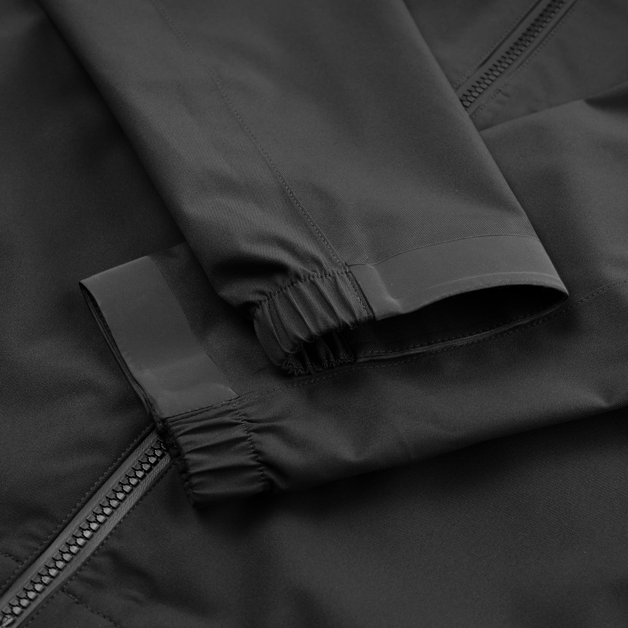 Waterproof rain jacket in black elastic cuff detail