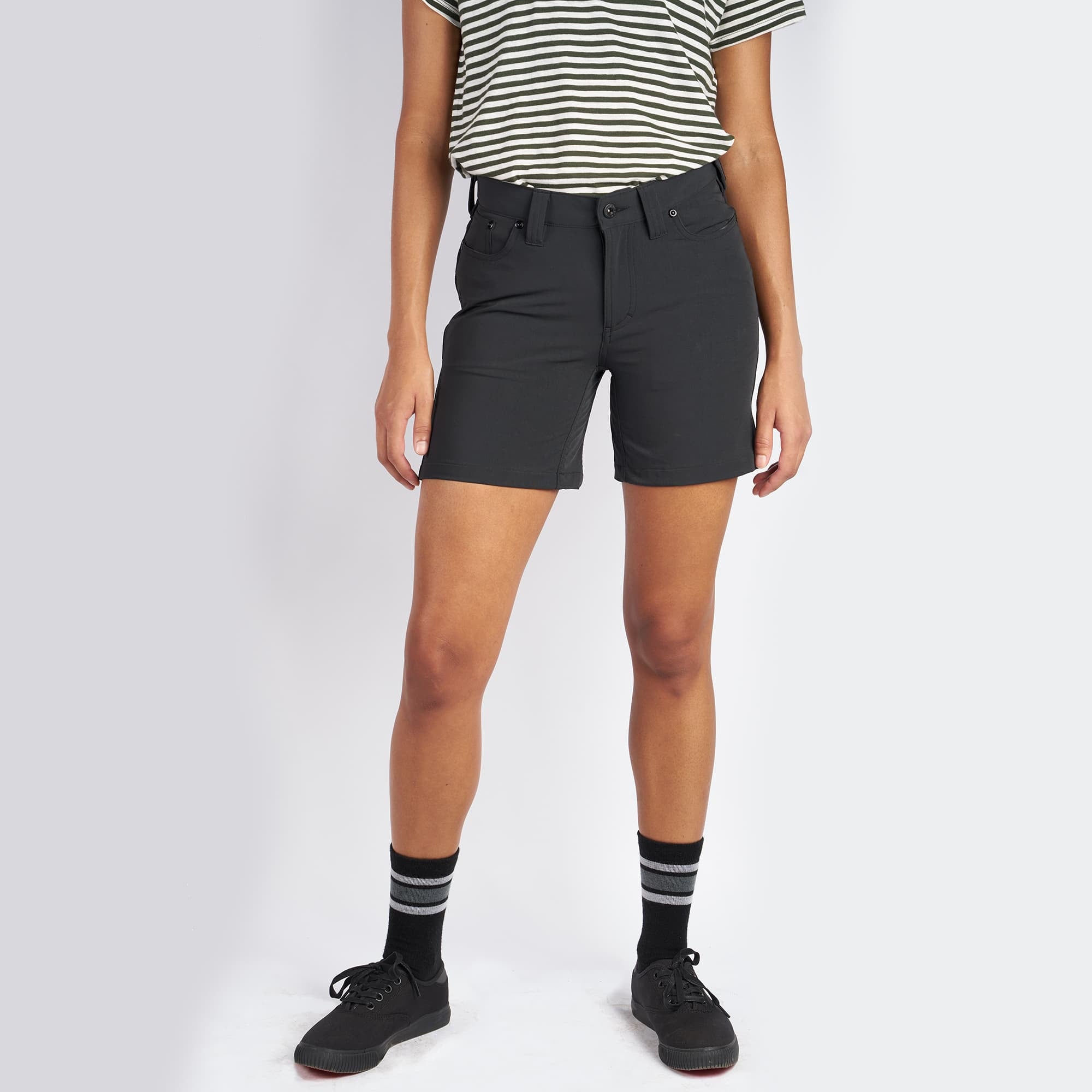 Women's Anza technical short in black worn by a woman #color_black