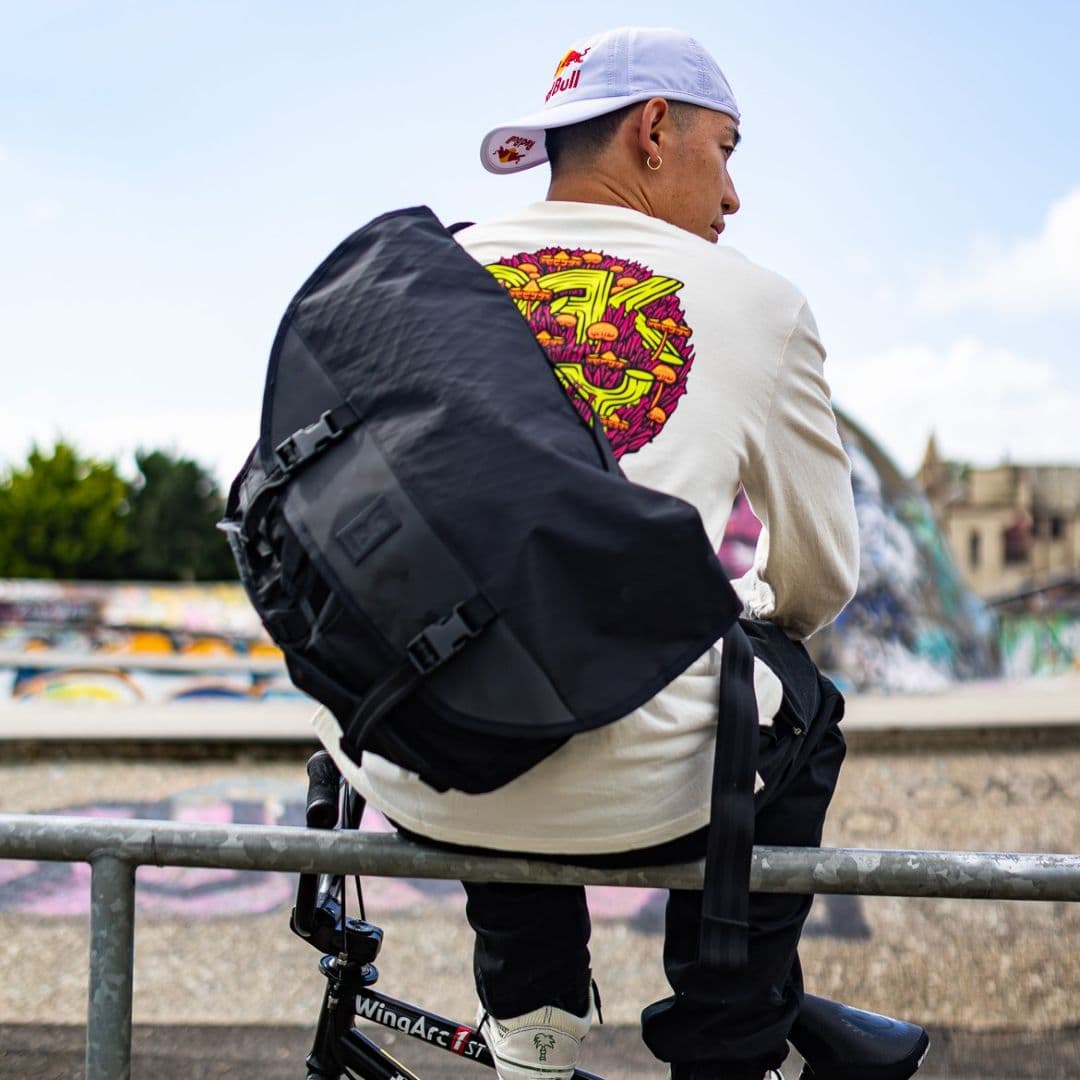 Rim Nakamura wearing a Citizen 24L Messenger Bag