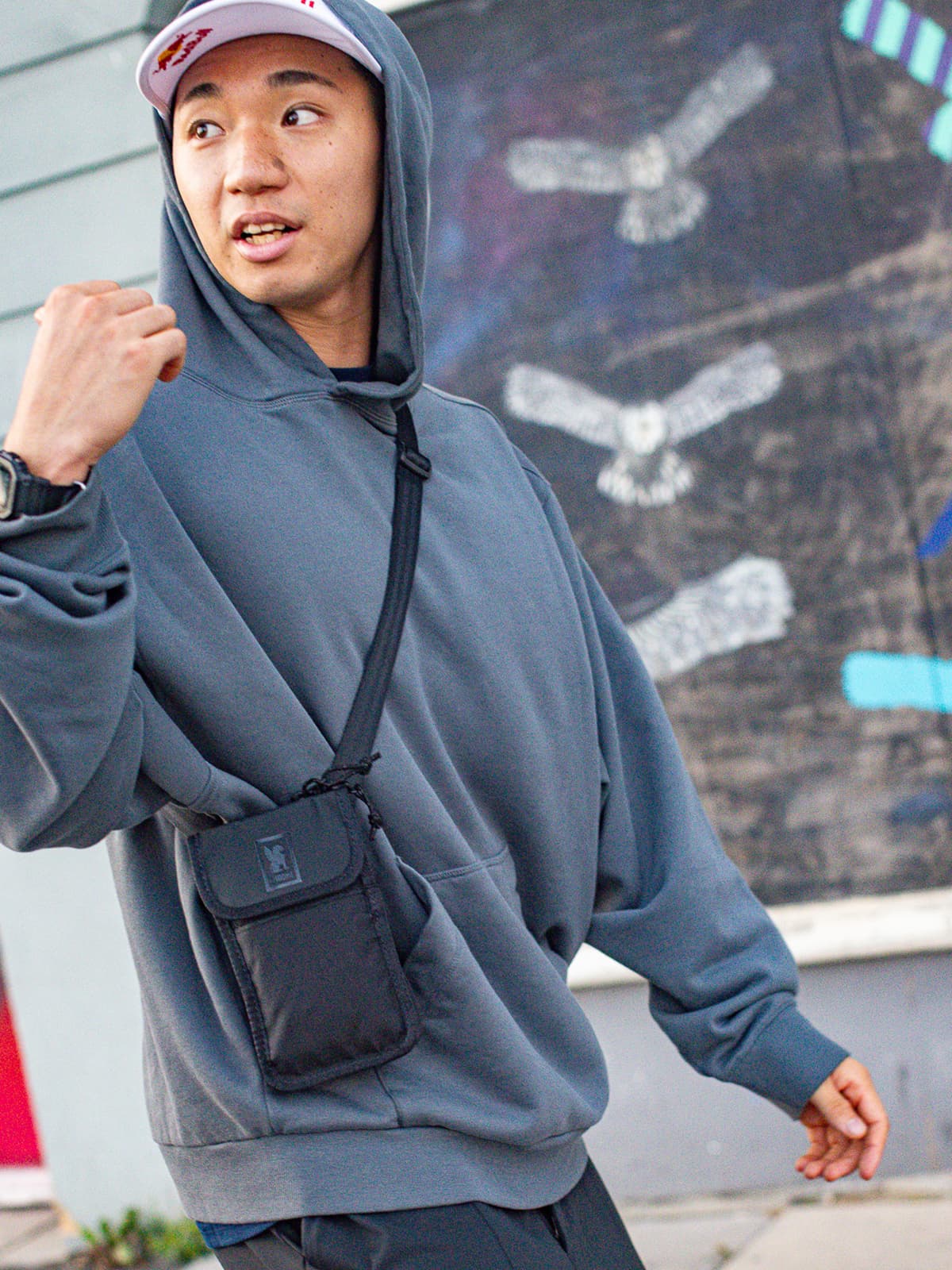 Rim Nakamura wearing the Travel Tech Pouch