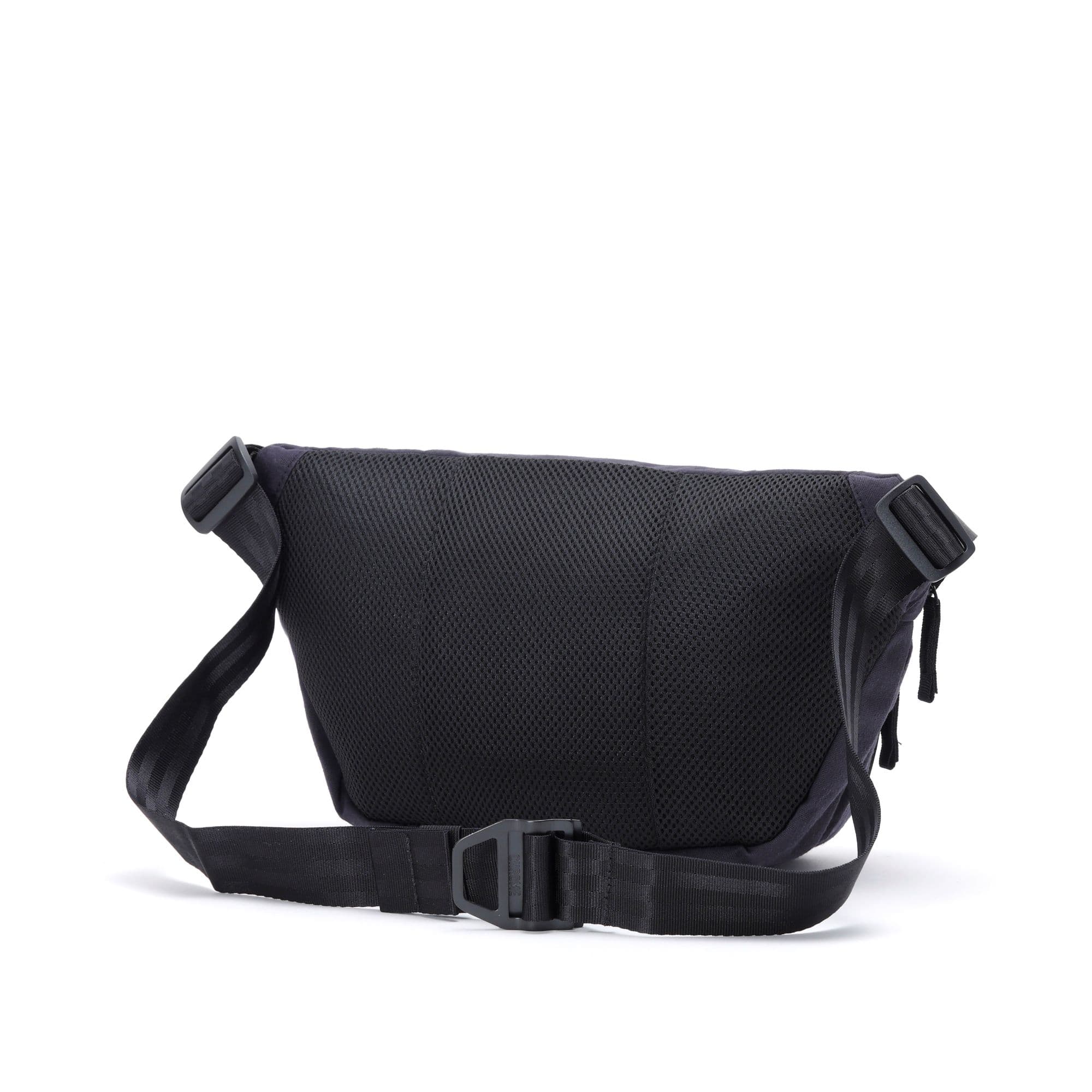 The back of the Bot Flap 5L Sling n Black Canvas Leather #color_black canvas leather