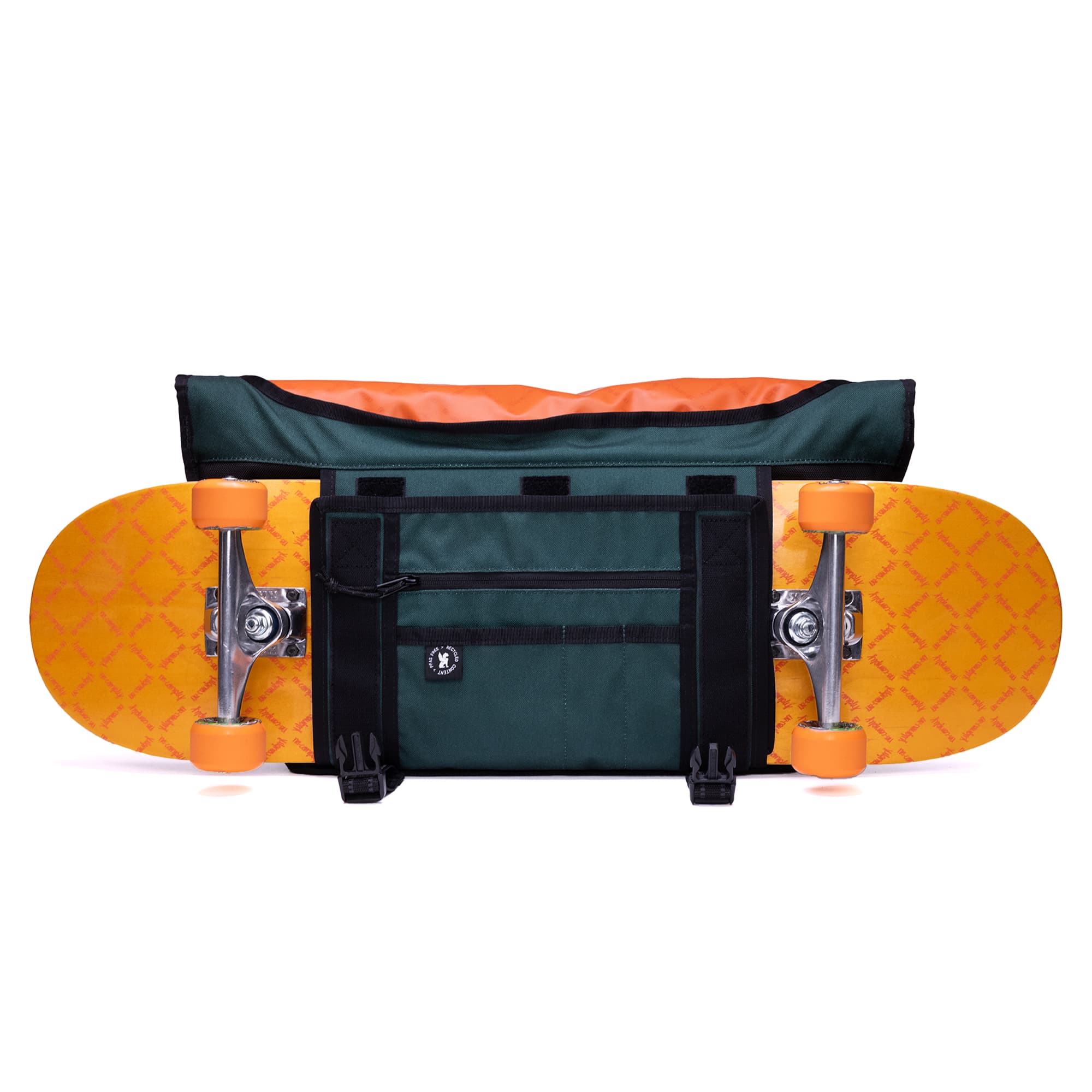 The Chrome x No-Comply Citizen 24L Skate Messenger in green holding a skate board