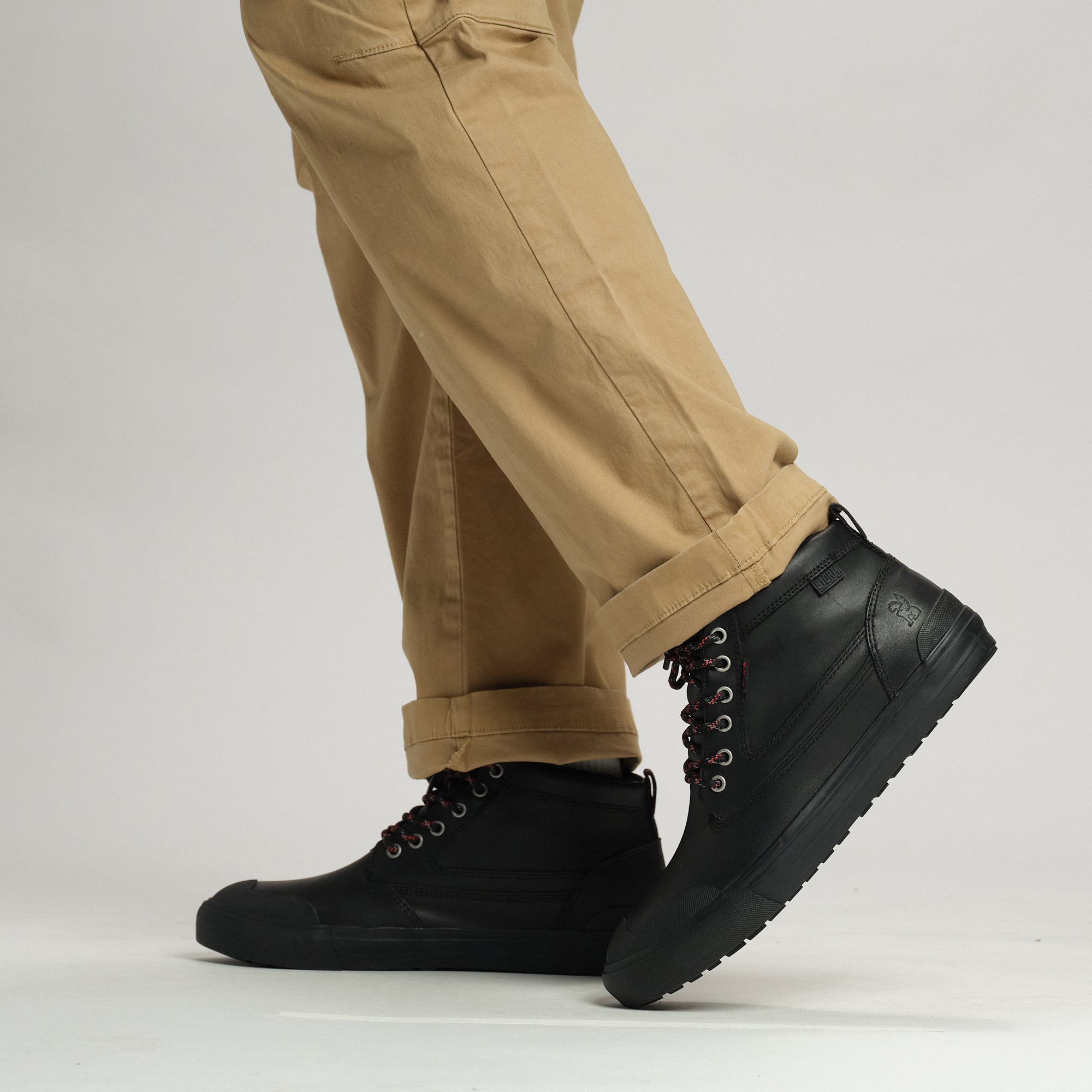 Black Storm 415 boot on a person #color_black