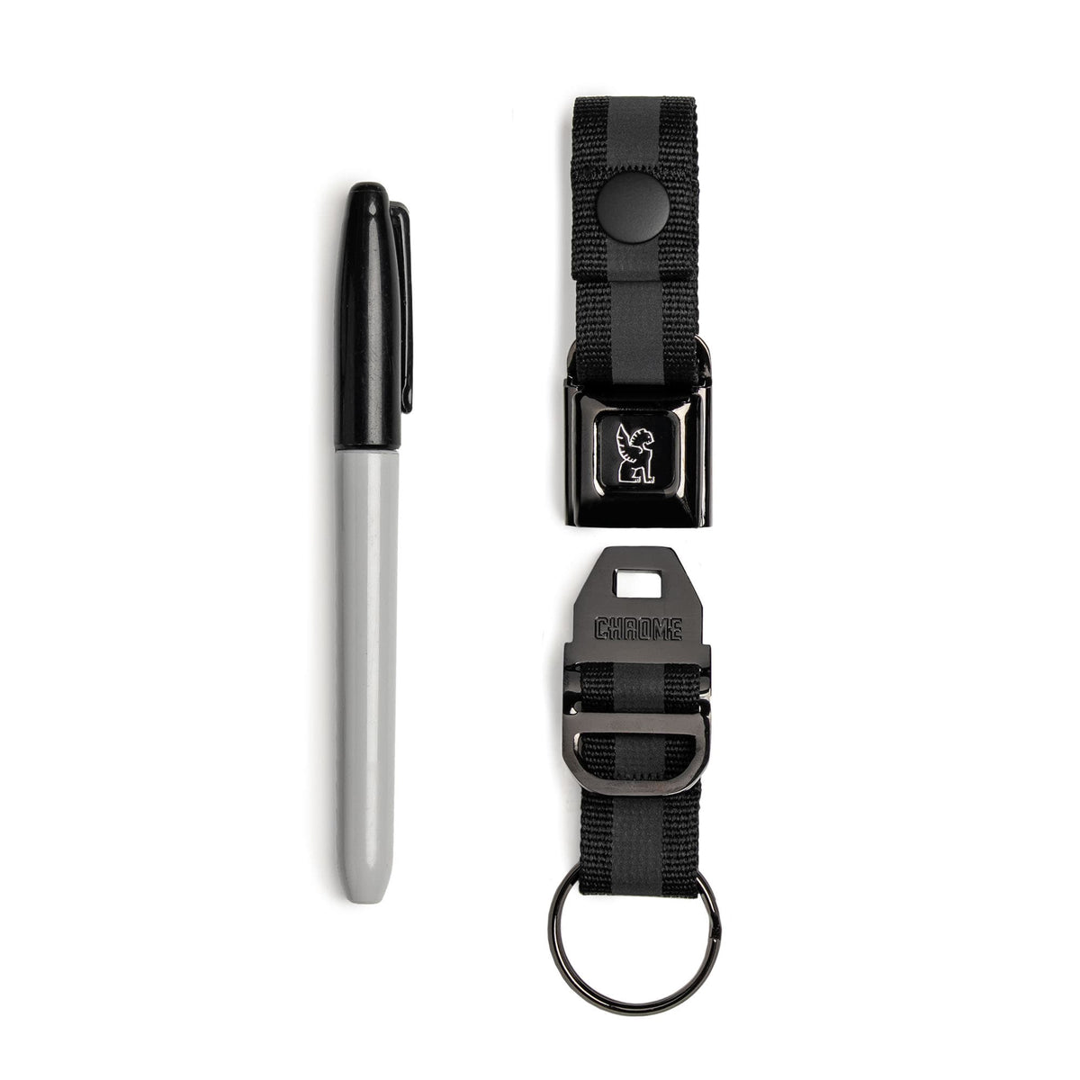 Our updated Mini Buckle Keychain in Black Chrome open with a sharpie by it for scale #color_black chrome