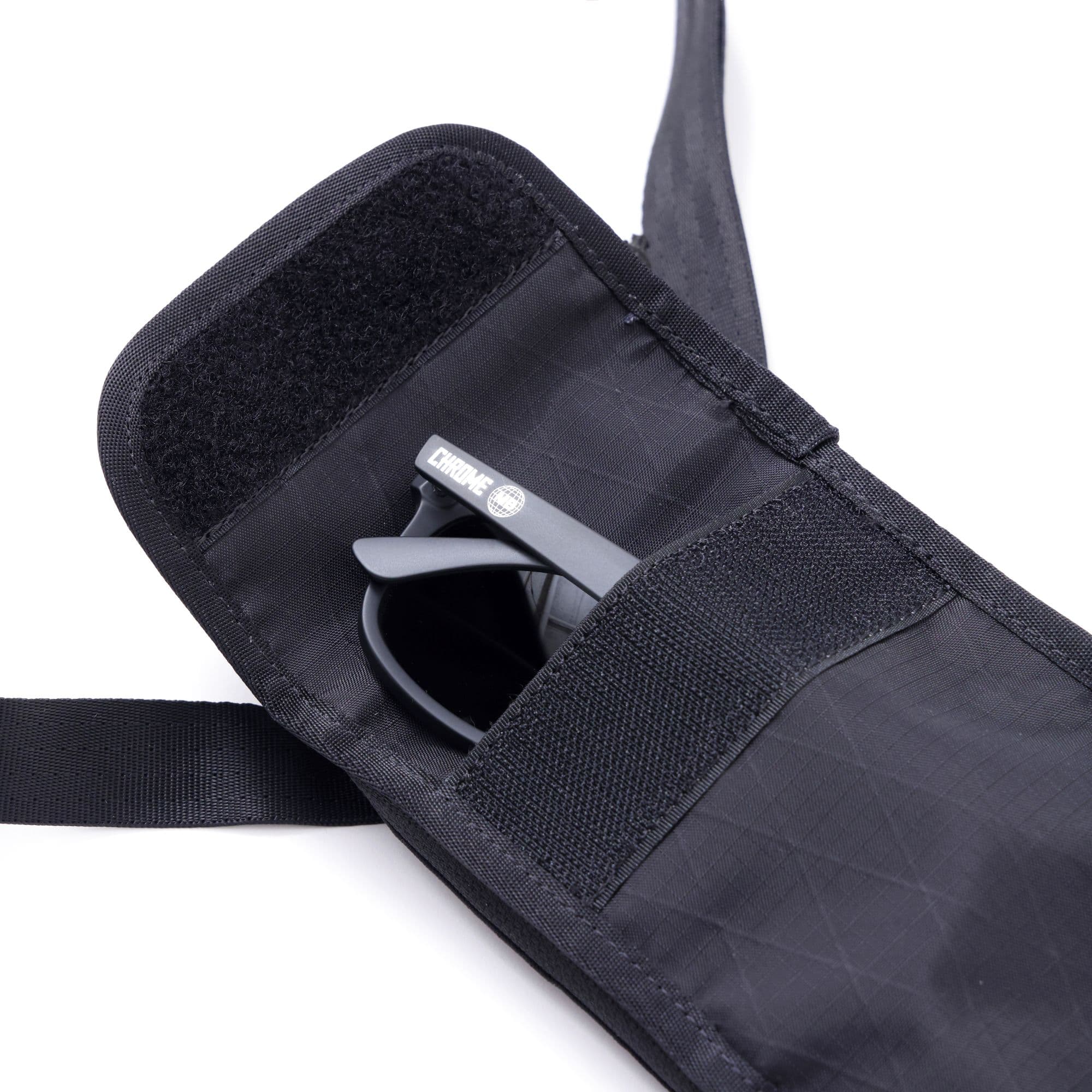 Sunglasses in the Travel Tech Pouch in black