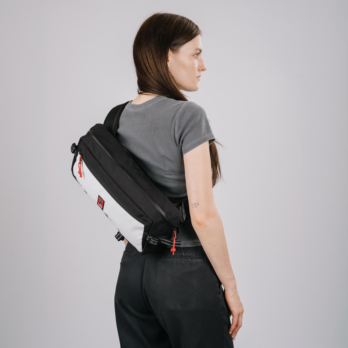 The back on a woman of the Kadet in the new Holiday Black and White Collection #color_classic / black / white