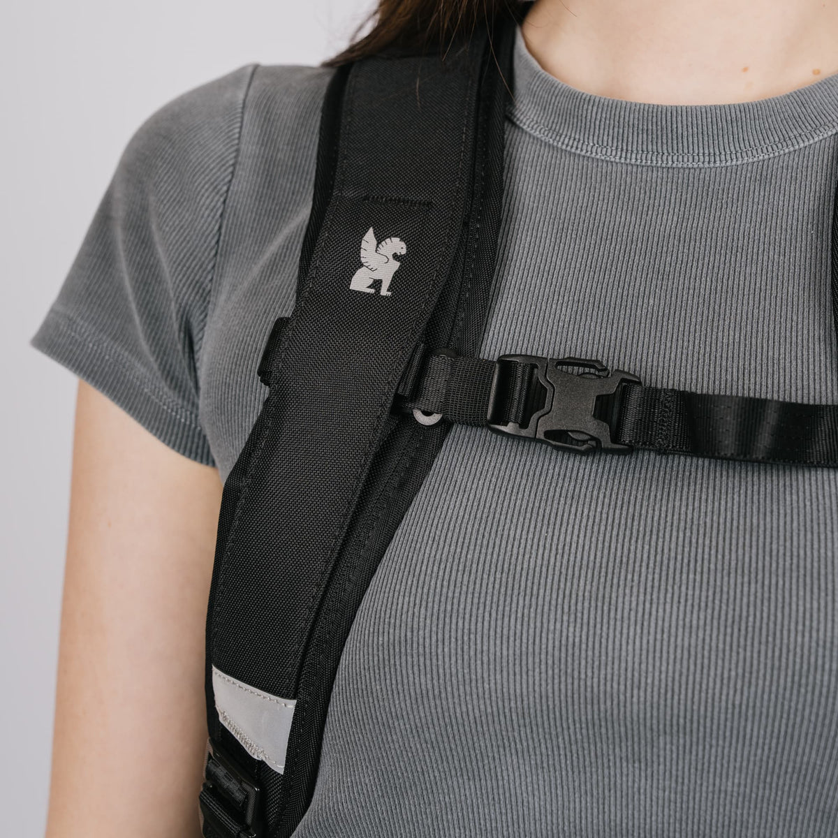 Up close strap detail of the Barrage 22L in new Classic Black White #color_classic / black / white