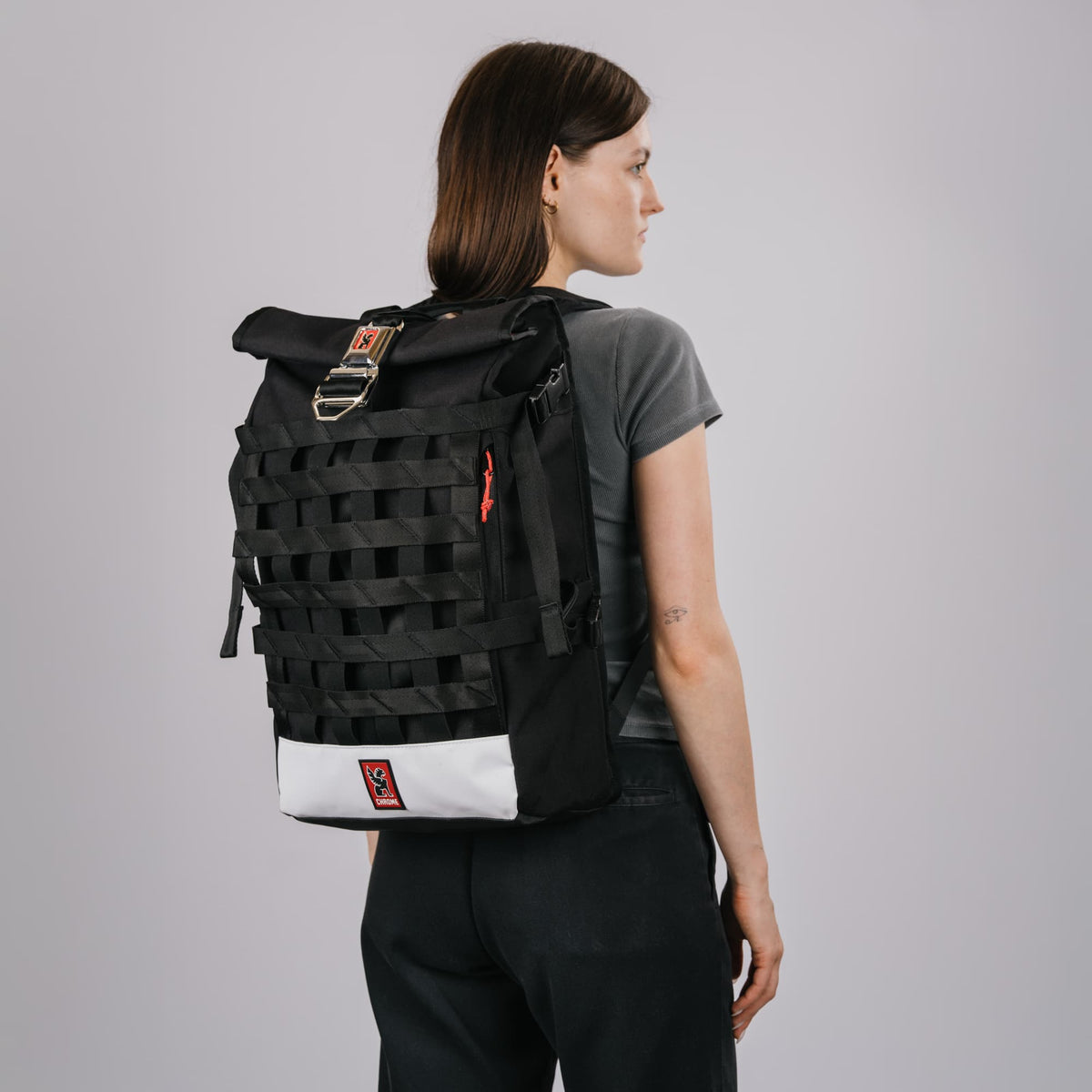 The Barrage 22L in new Classic Black White back view on a woman #color_classic / black / white