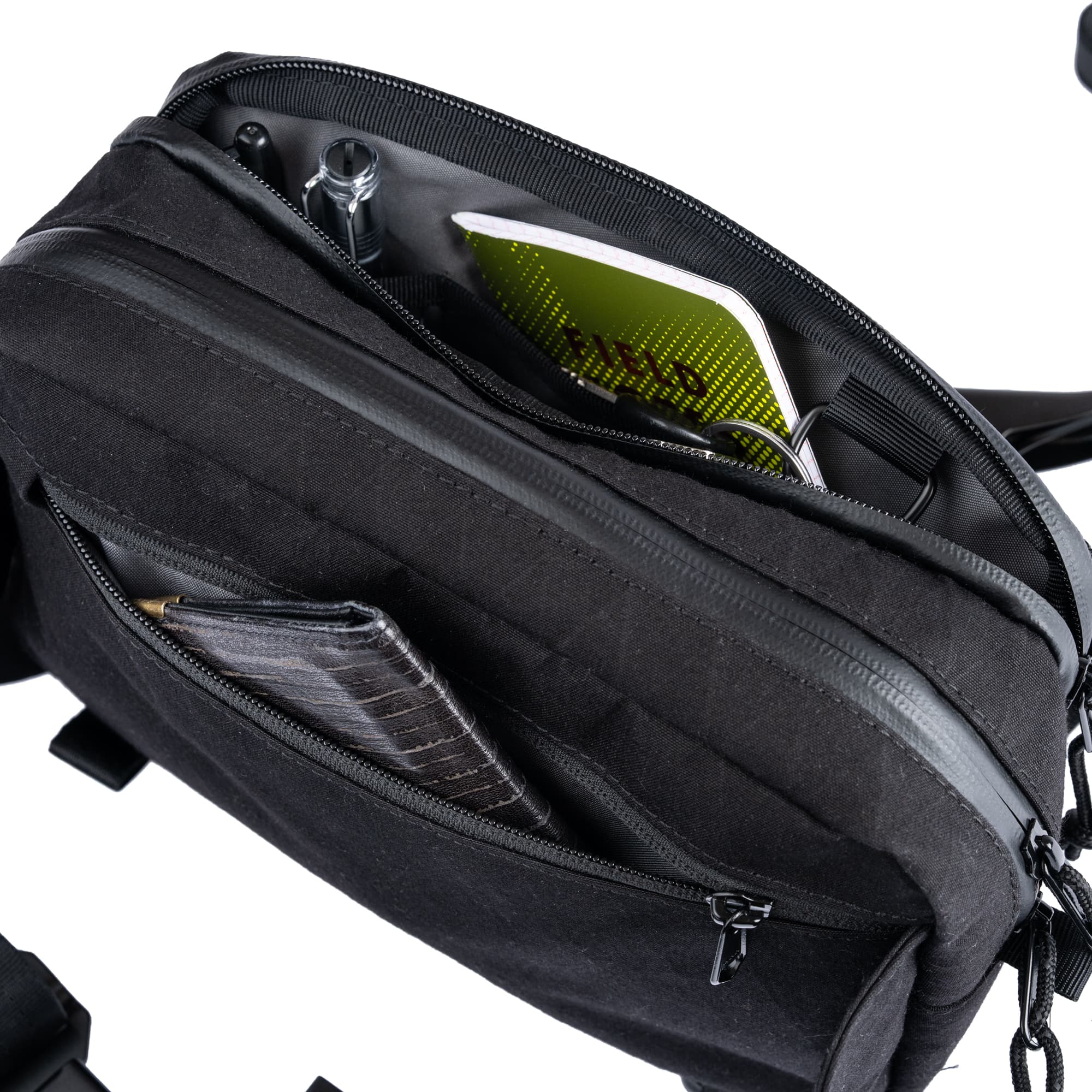 An up-close look at the zipper pockets of the Barrage 5L Sling