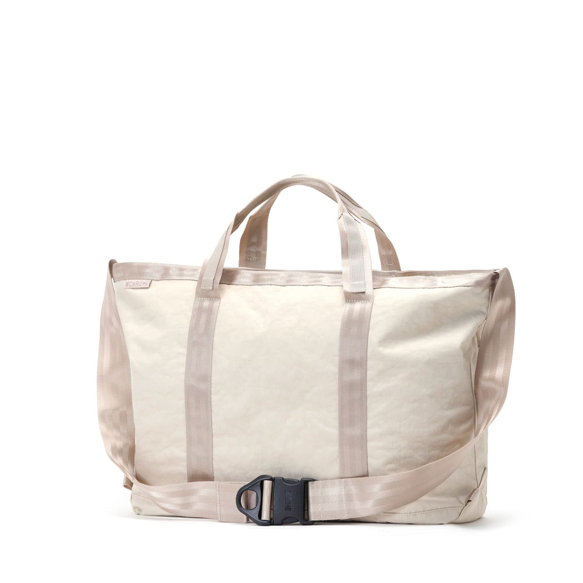 The strap on back of the Messenger 28L Tote now in a chalk color #color_chalk