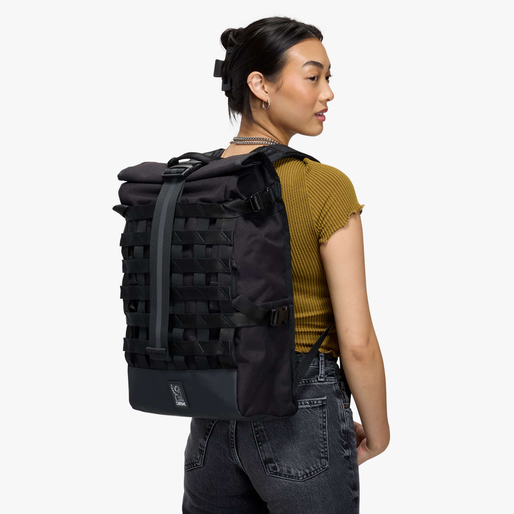 Woman wearing a 22L Barrage Backpack