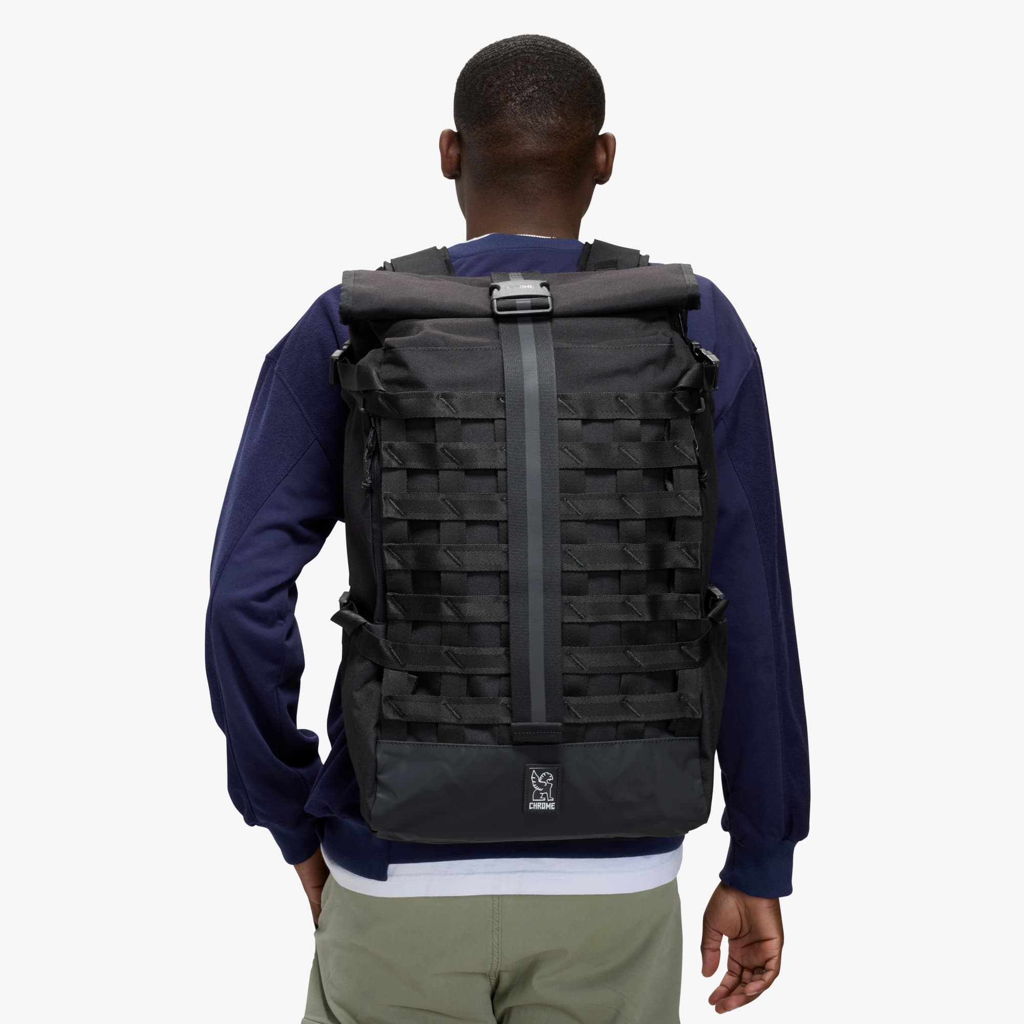 The Barrage 34L worn by a man in blue