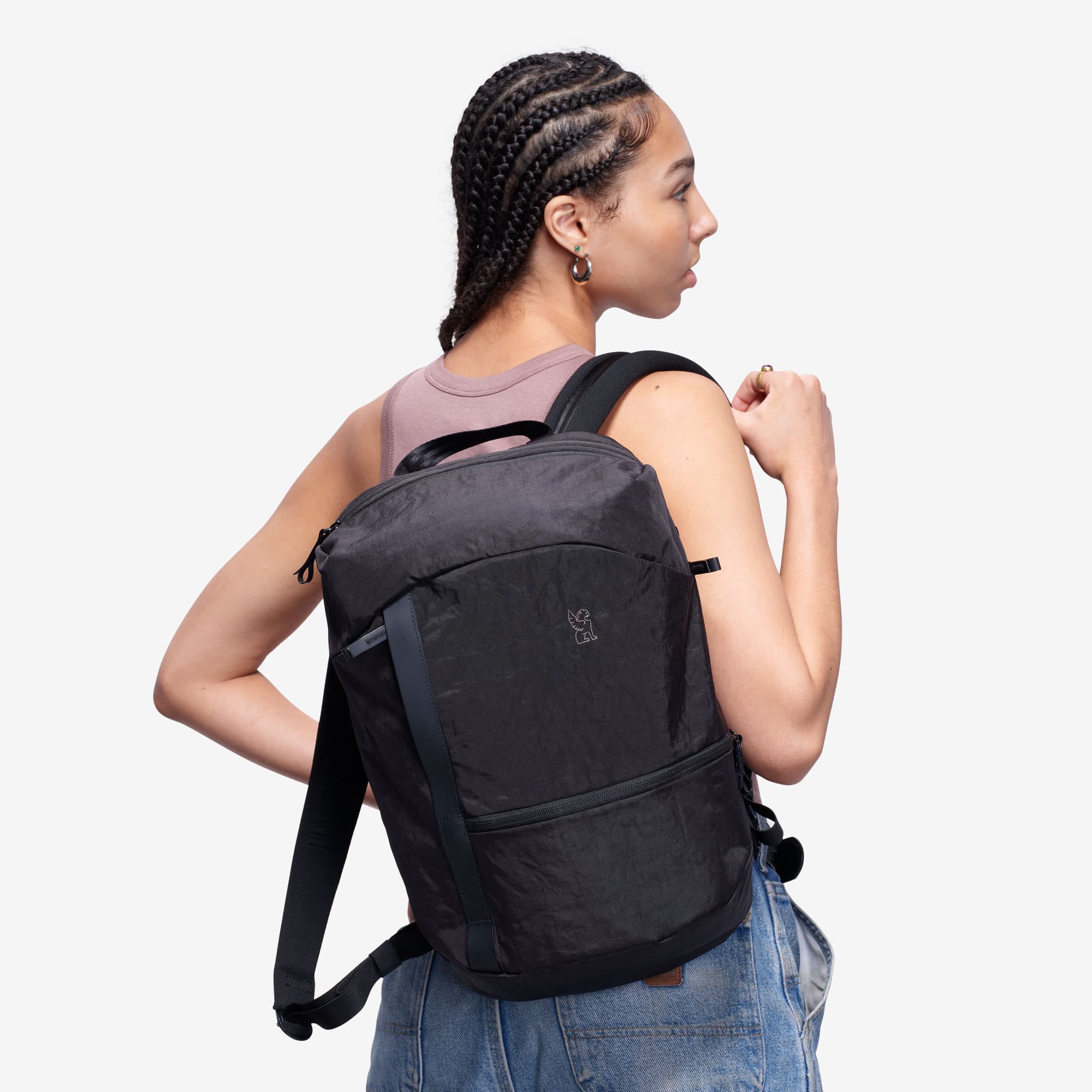 Camden backpack in black on a woman back view