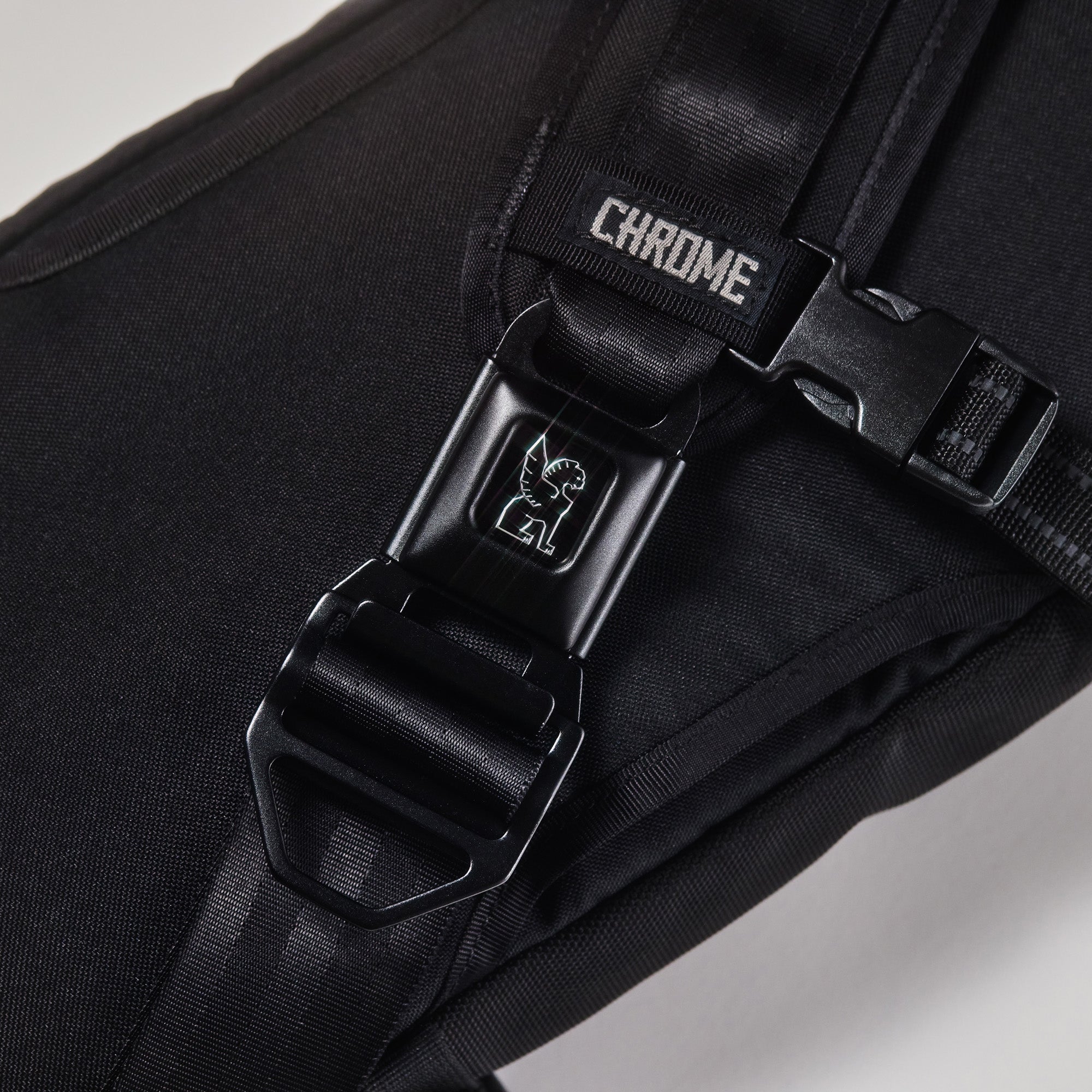 Chrome LG iconic buckle in black shown on a Kadet #color_black