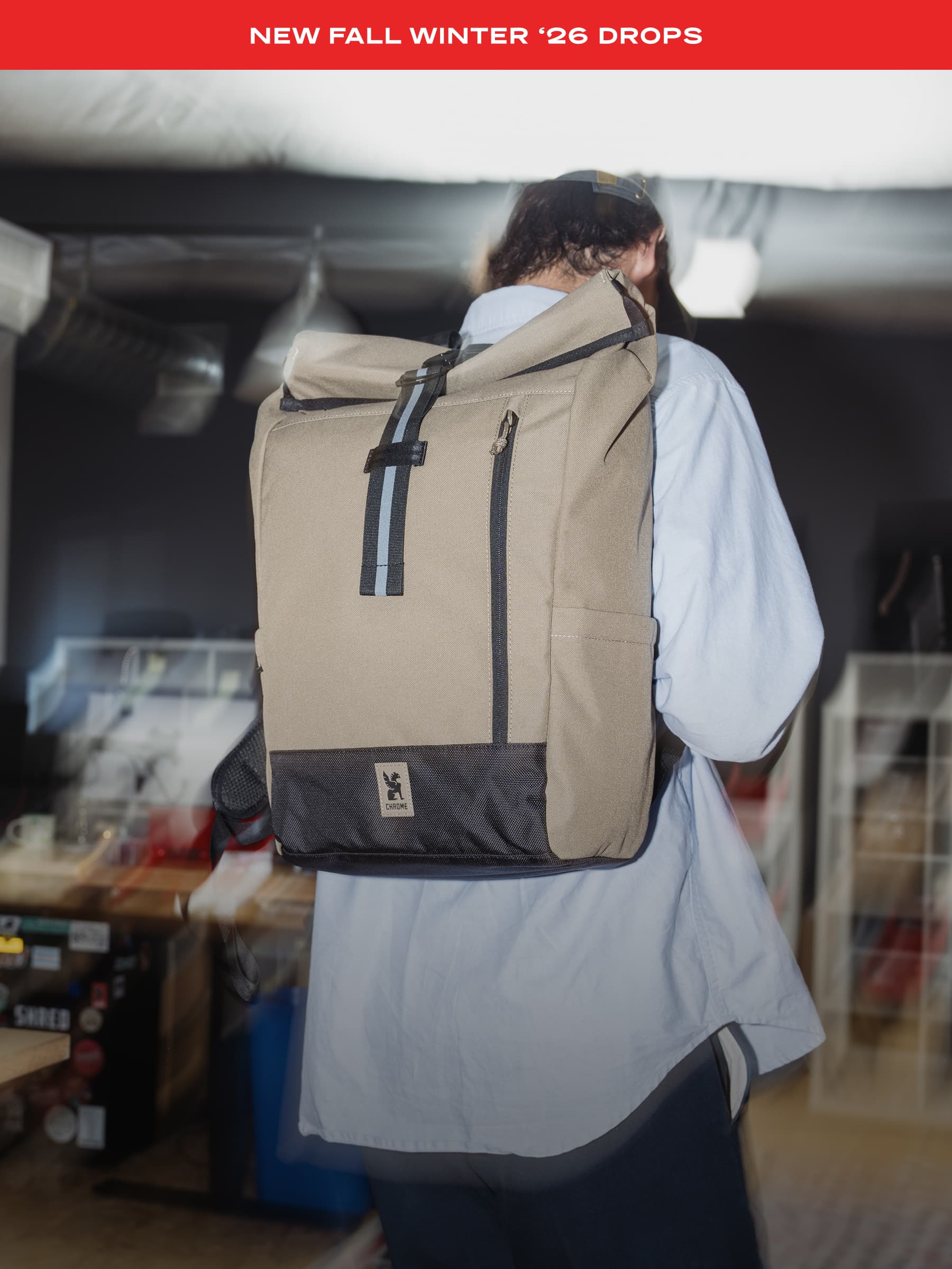 A guy wearing the new Initiate 26L Pack in brown