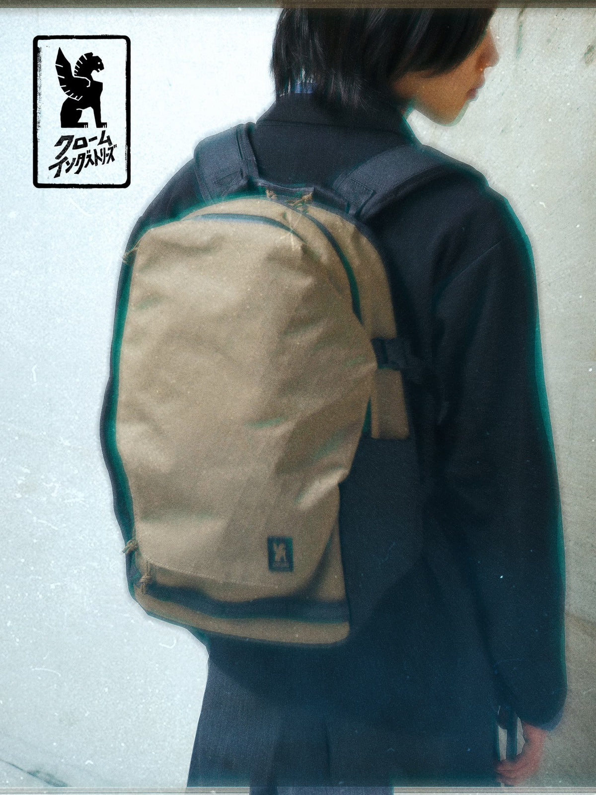A guy wearing the Extlek Backpack in Coyote