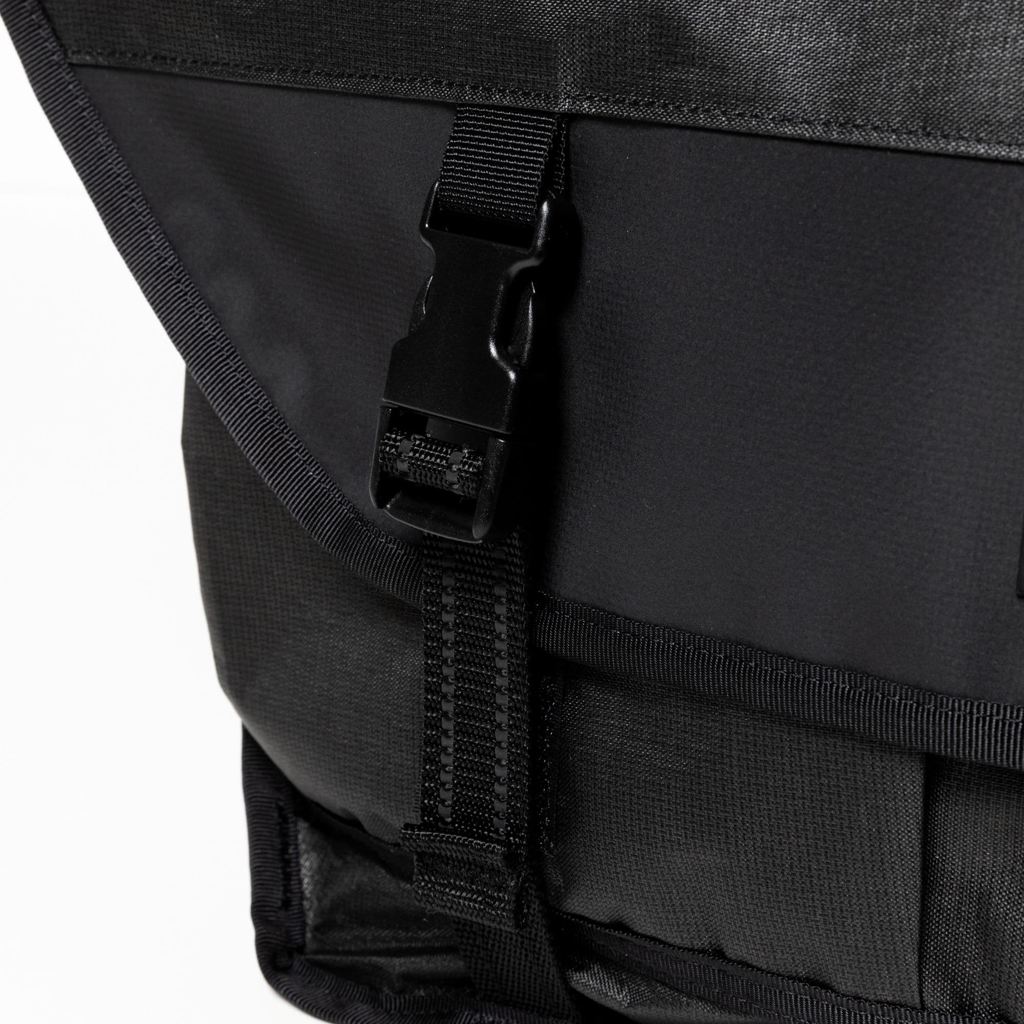 The front strap of the Chrome x Meanswhile Citizen 24L Messenger