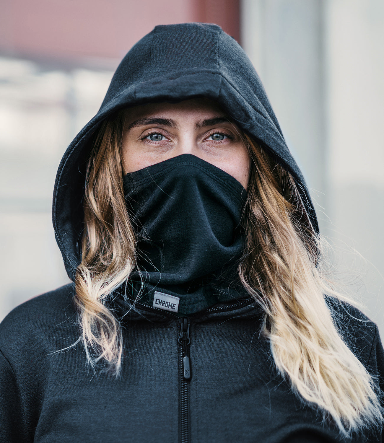 Merino Gaiter worn by a woman with a hoodie on mobile image size