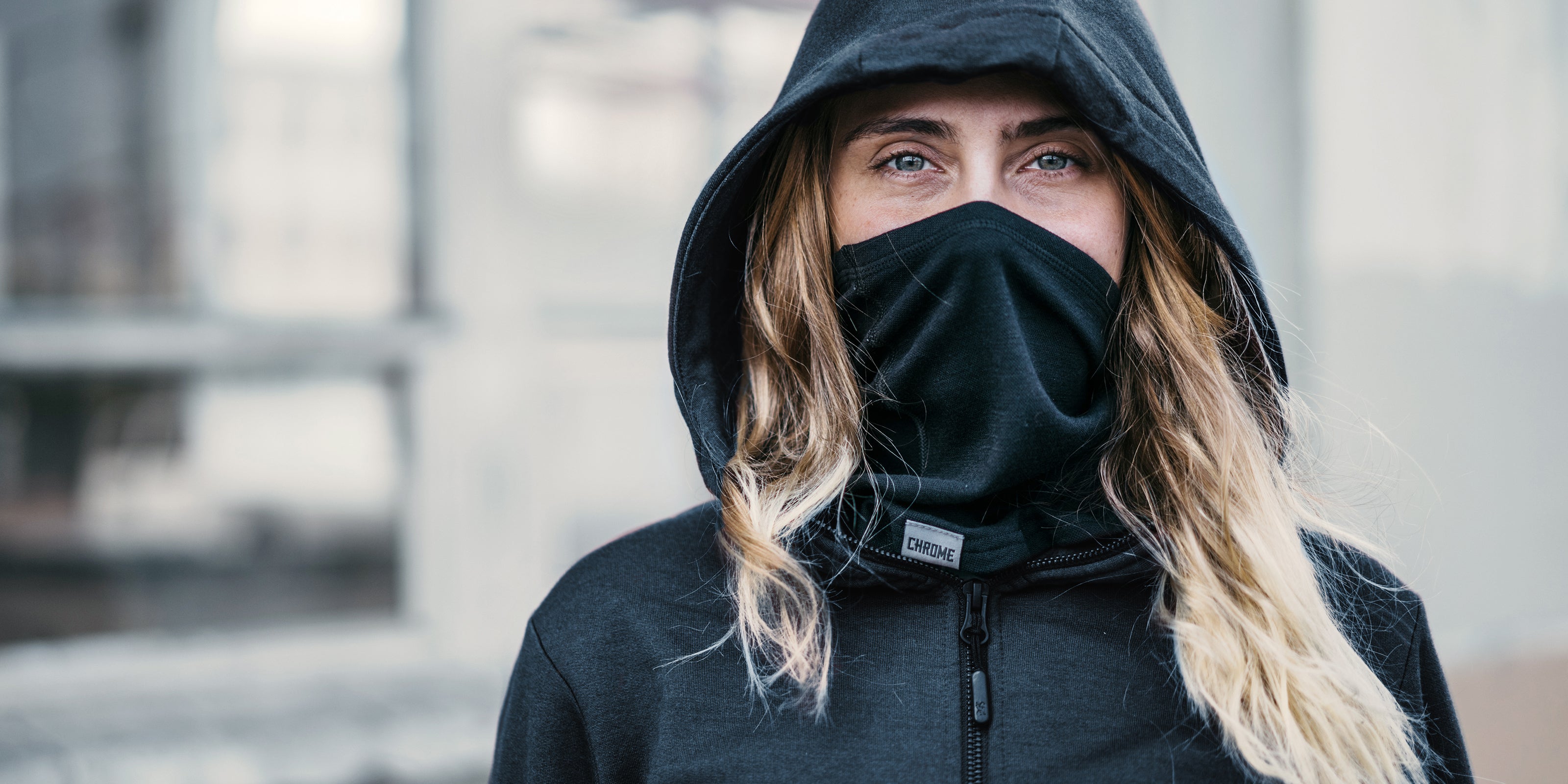 Merino Gaiter worn by a woman with a hoodie on desktop image size