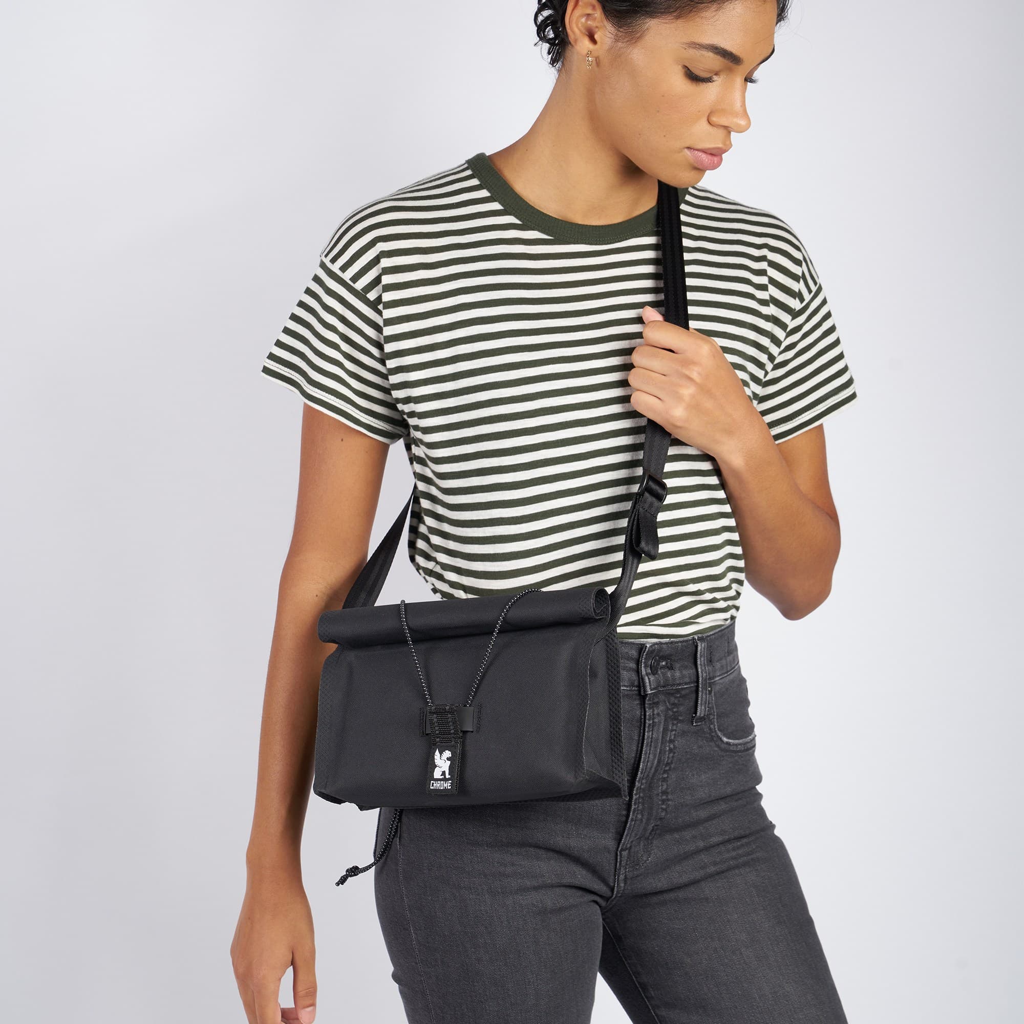 Urban Ex handlebar bag worn by a woman as a sling
