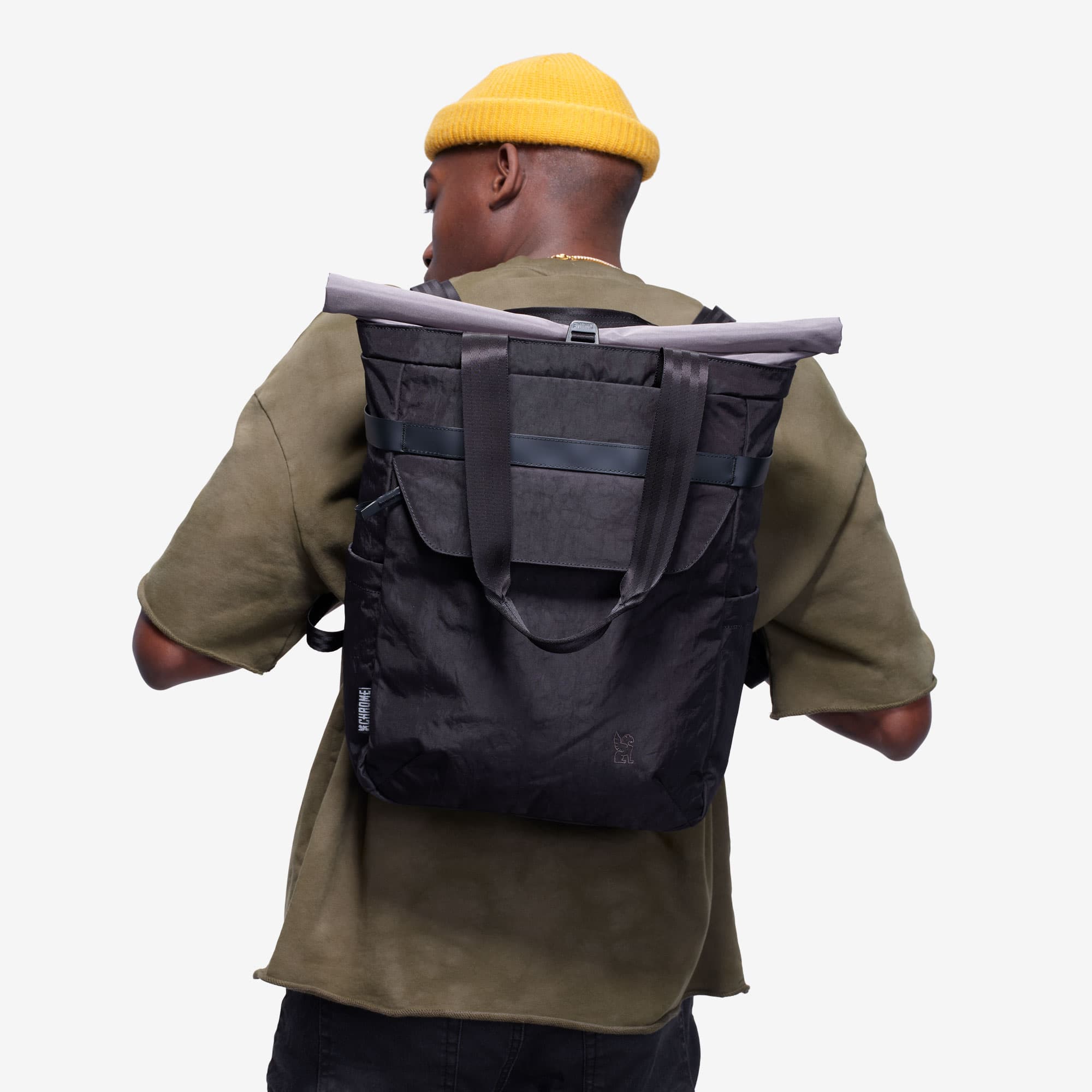 Valencia tote on a man as a backpack